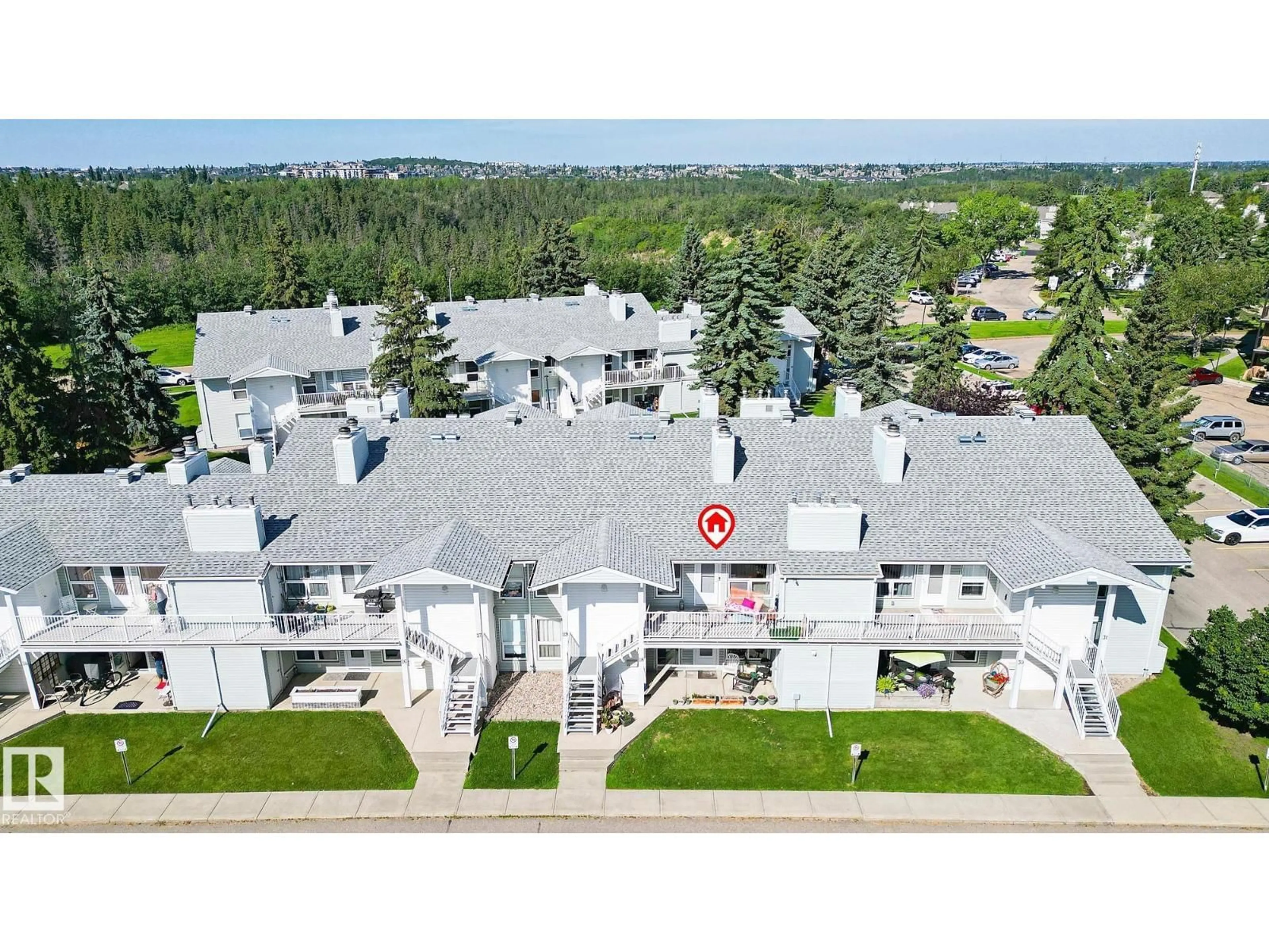A pic from outside/outdoor area/front of a property/back of a property/a pic from drone, unknown for 29 2115 118 ST NW, Edmonton Alberta T6J5N1