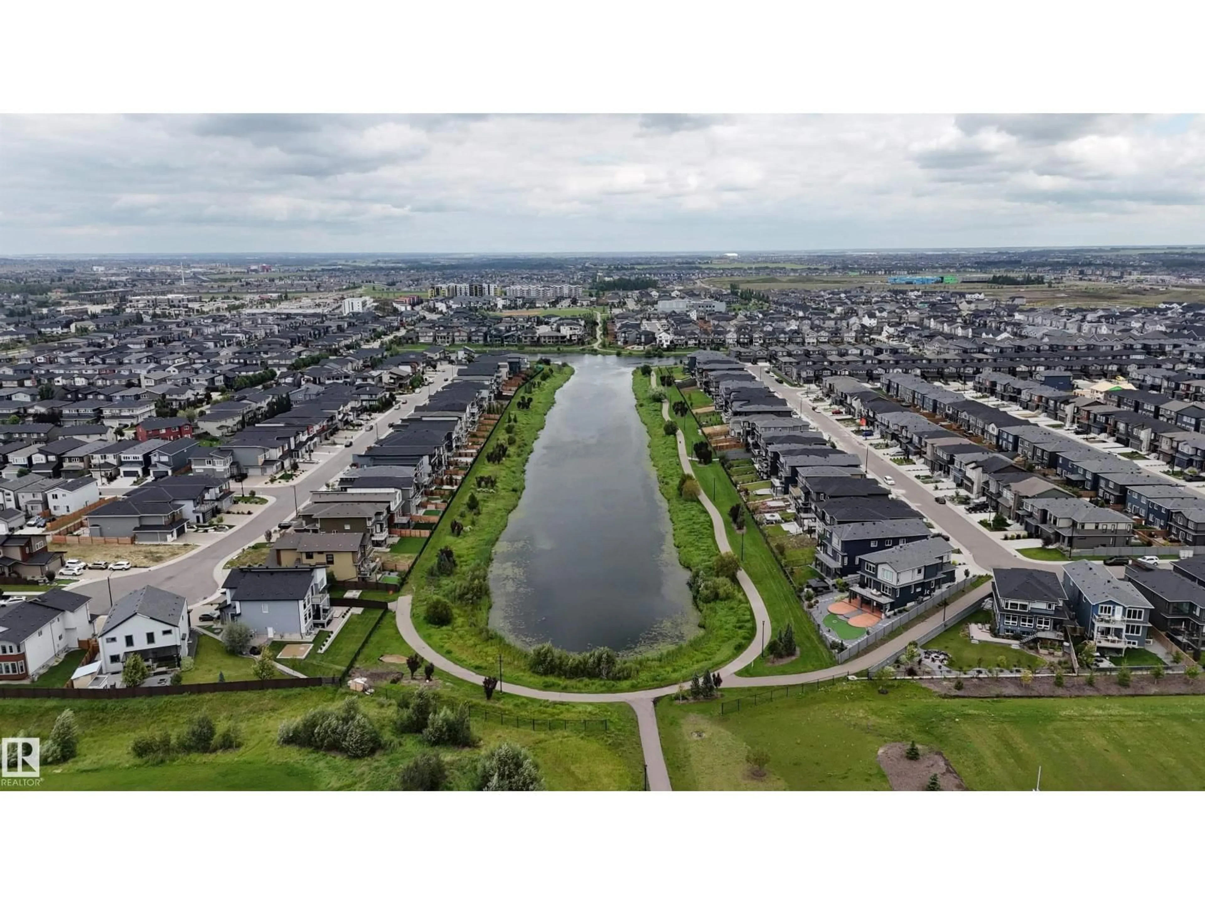 A pic from outside/outdoor area/front of a property/back of a property/a pic from drone, water/lake/river/ocean view for SW - 6045 KING LANDING LD, Edmonton Alberta T6W4Z7