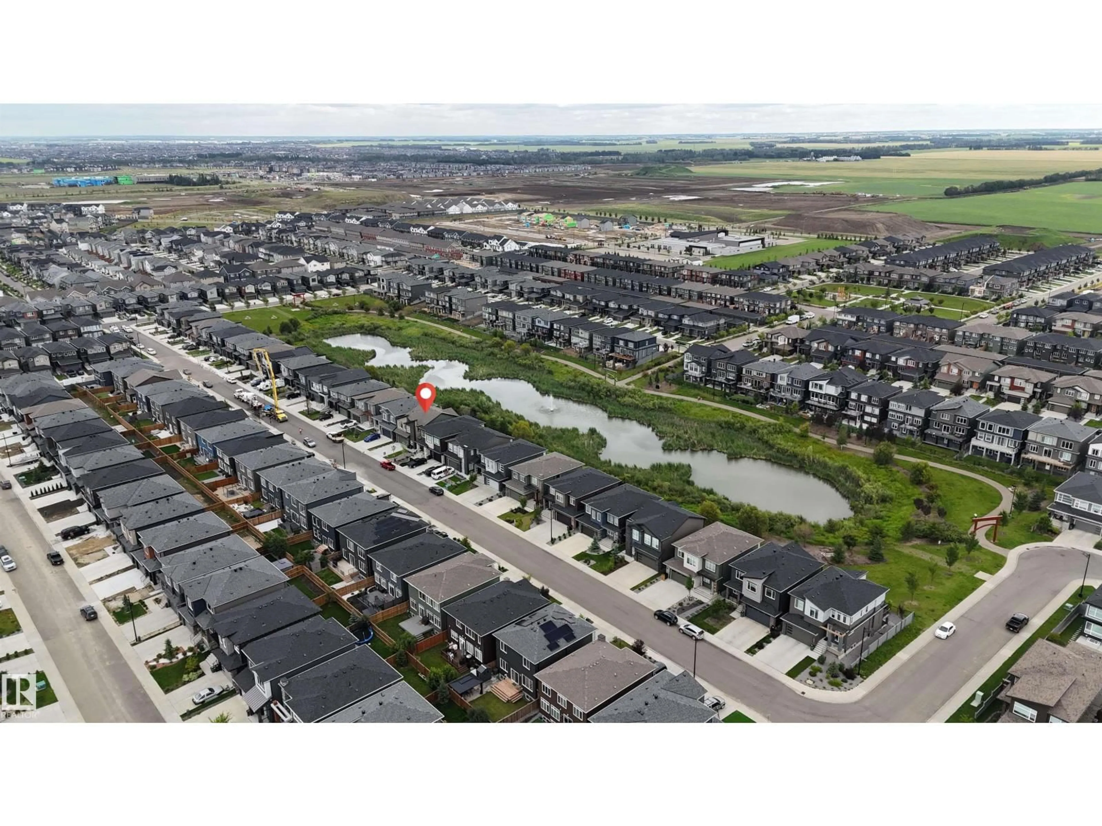 A pic from outside/outdoor area/front of a property/back of a property/a pic from drone, unknown for SW - 6045 KING LANDING LD, Edmonton Alberta T6W4Z7