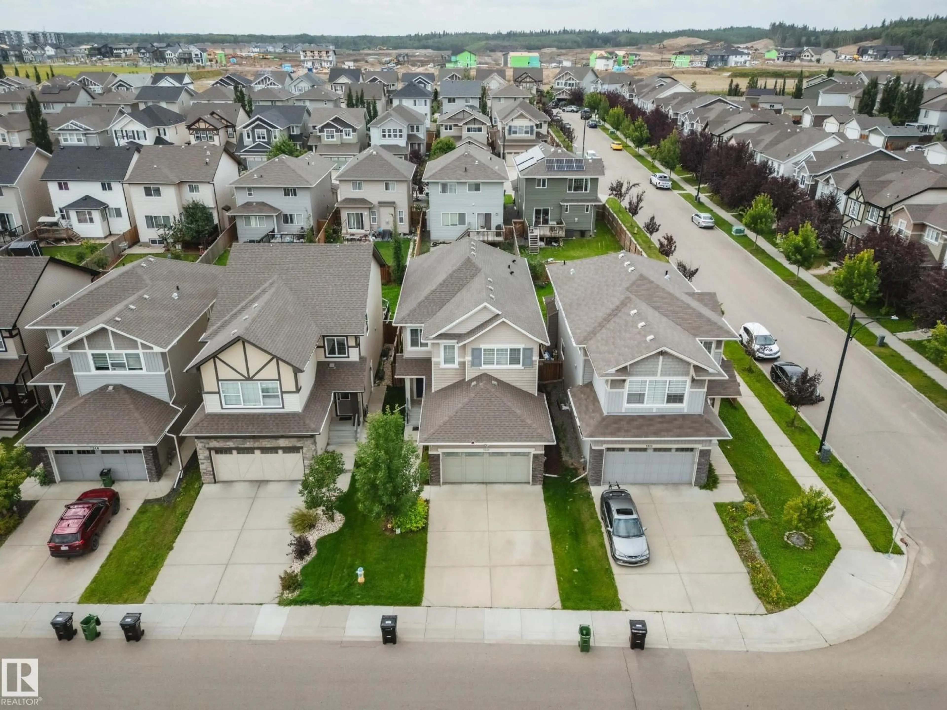 A pic from outside/outdoor area/front of a property/back of a property/a pic from drone, street for 7314 EDGEMONT WY, Edmonton Alberta T6M0S1