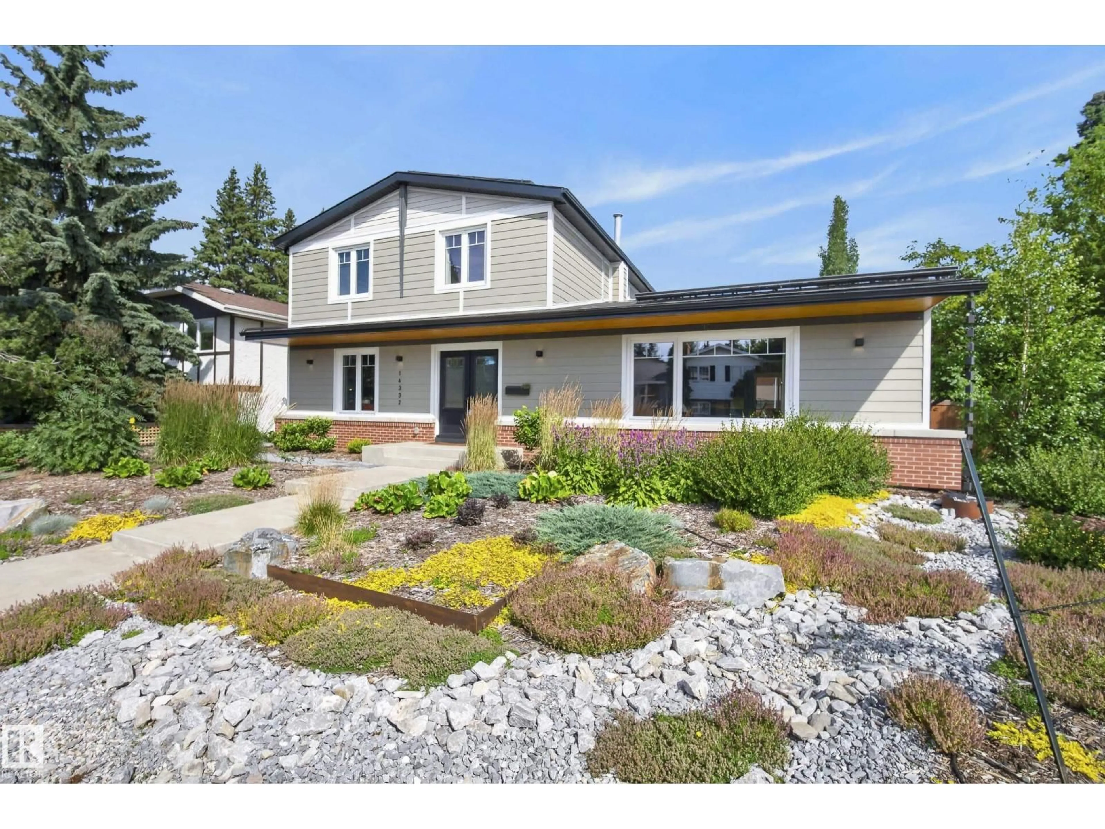 Home with vinyl exterior material, street for 14332 51 AV, Edmonton Alberta T6H0N1