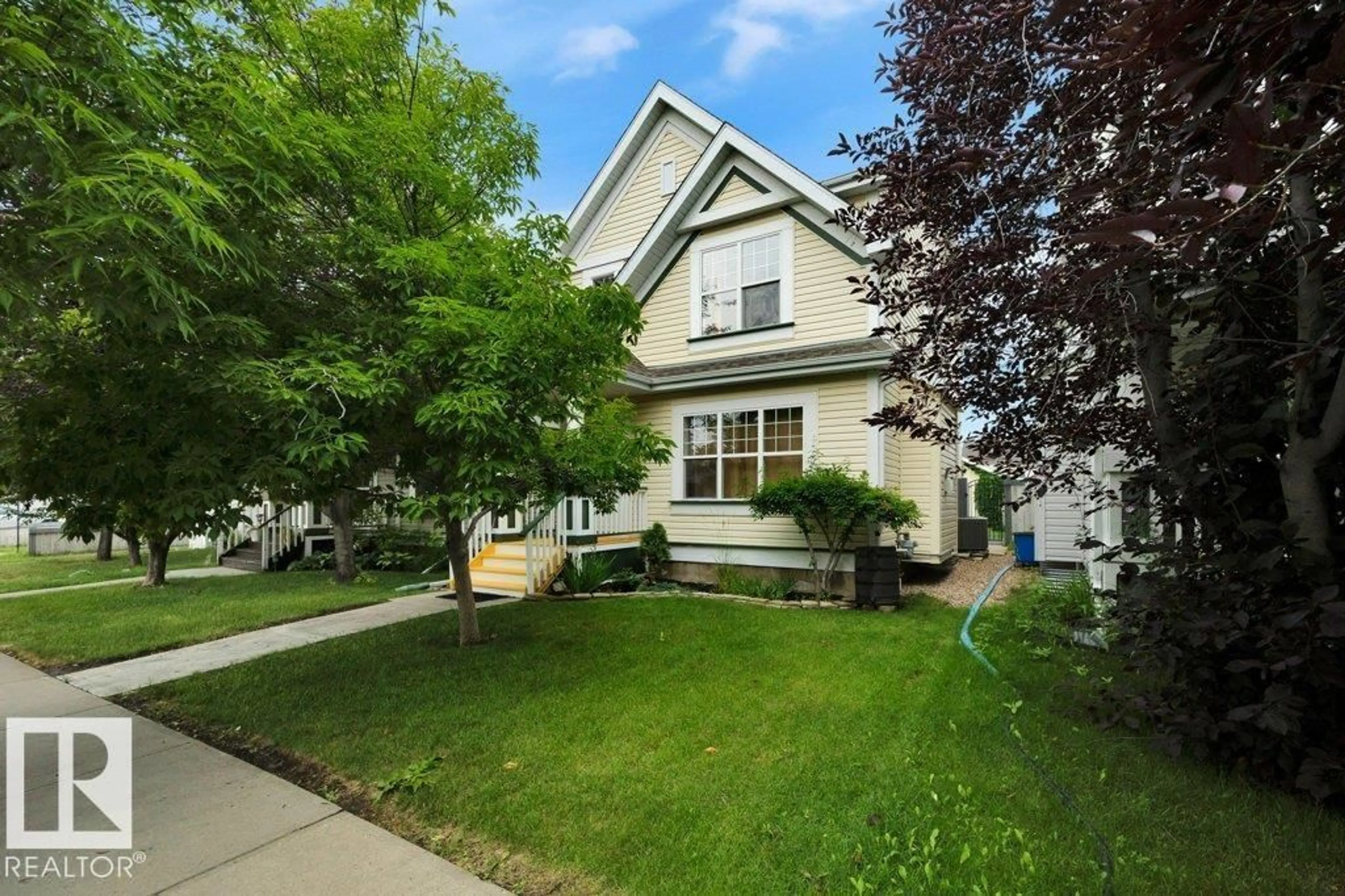 Home with vinyl exterior material, street for 7948 13 AV, Edmonton Alberta T6X1H4
