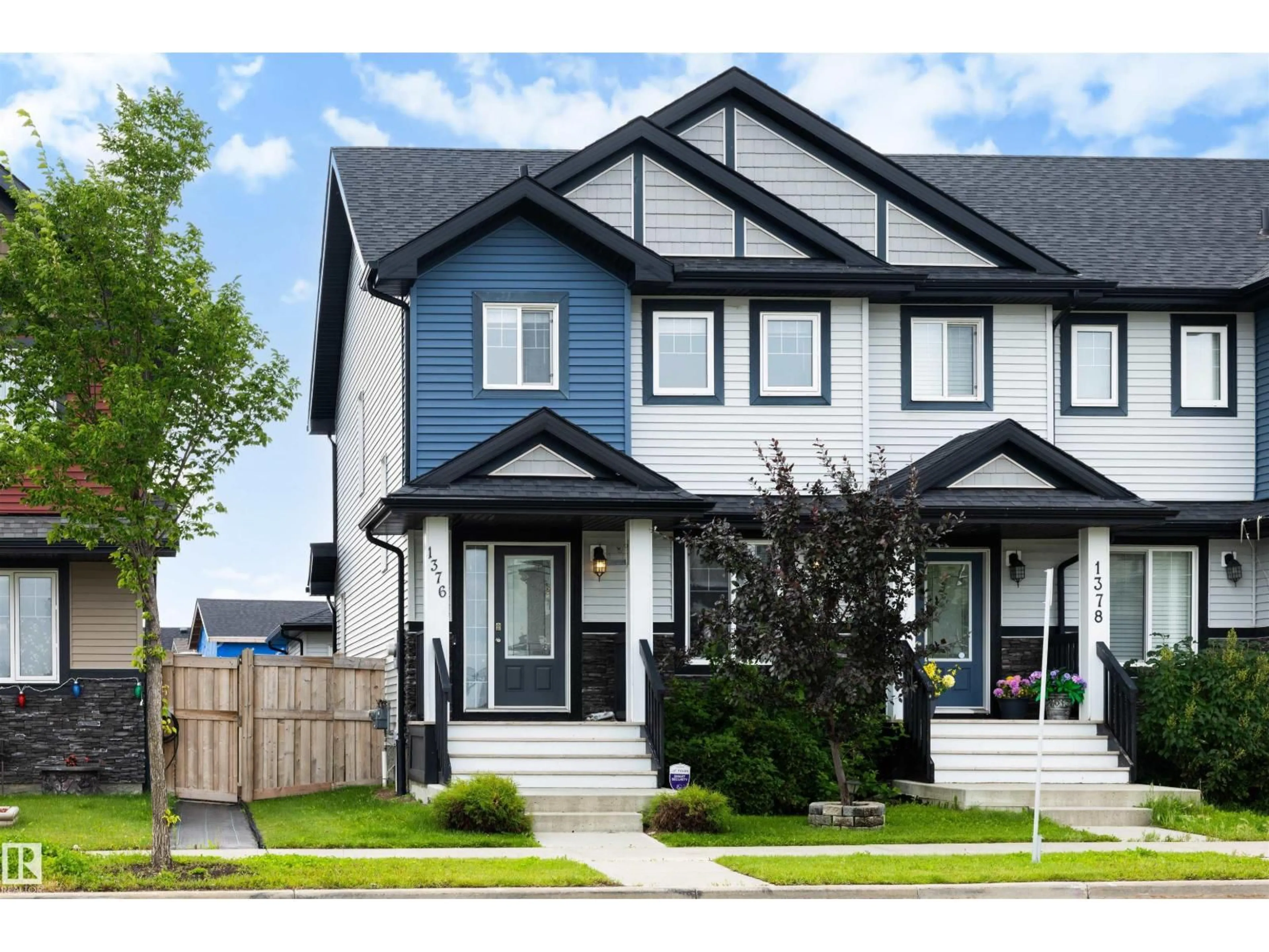 Home with vinyl exterior material, street for 1376 MCCONACHIE BV, Edmonton Alberta T5Y3X3