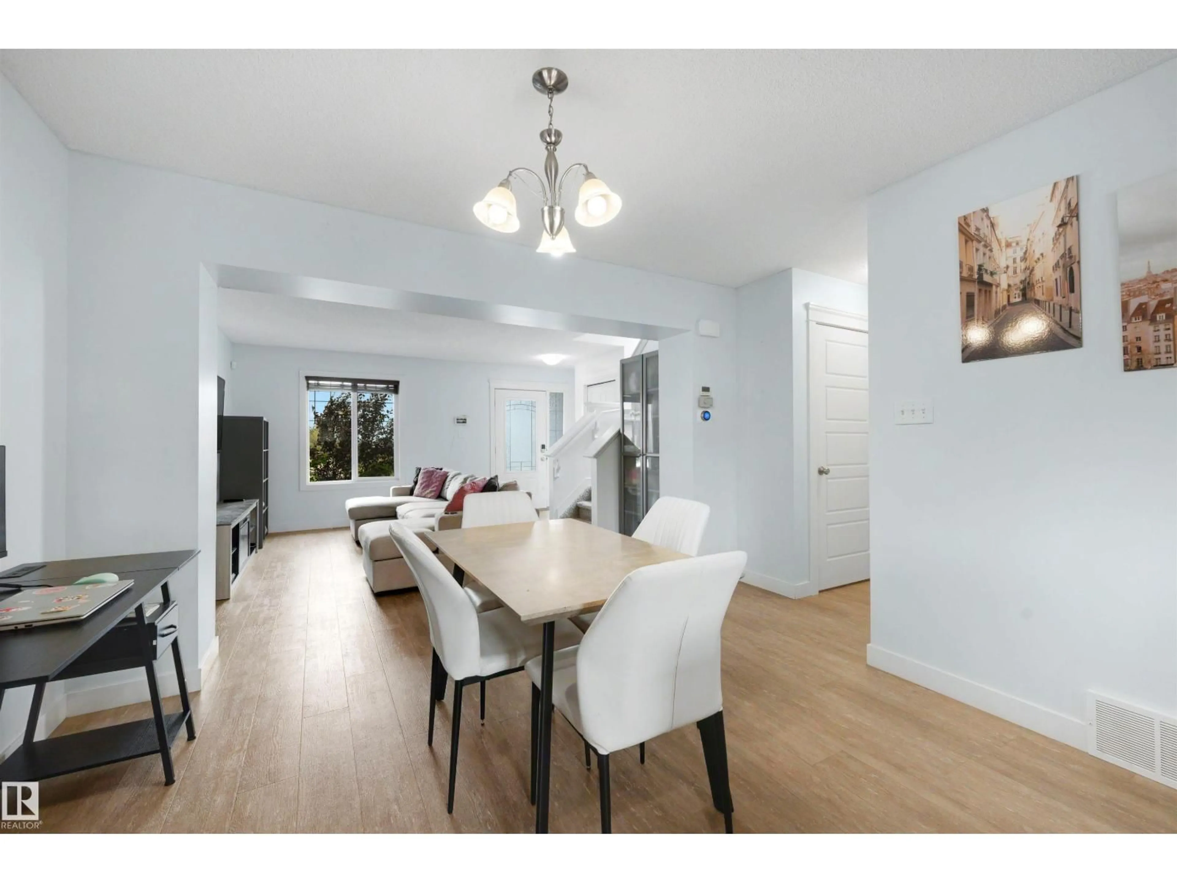 Dining room, wood/laminate floor for 1376 MCCONACHIE BV, Edmonton Alberta T5Y3X3