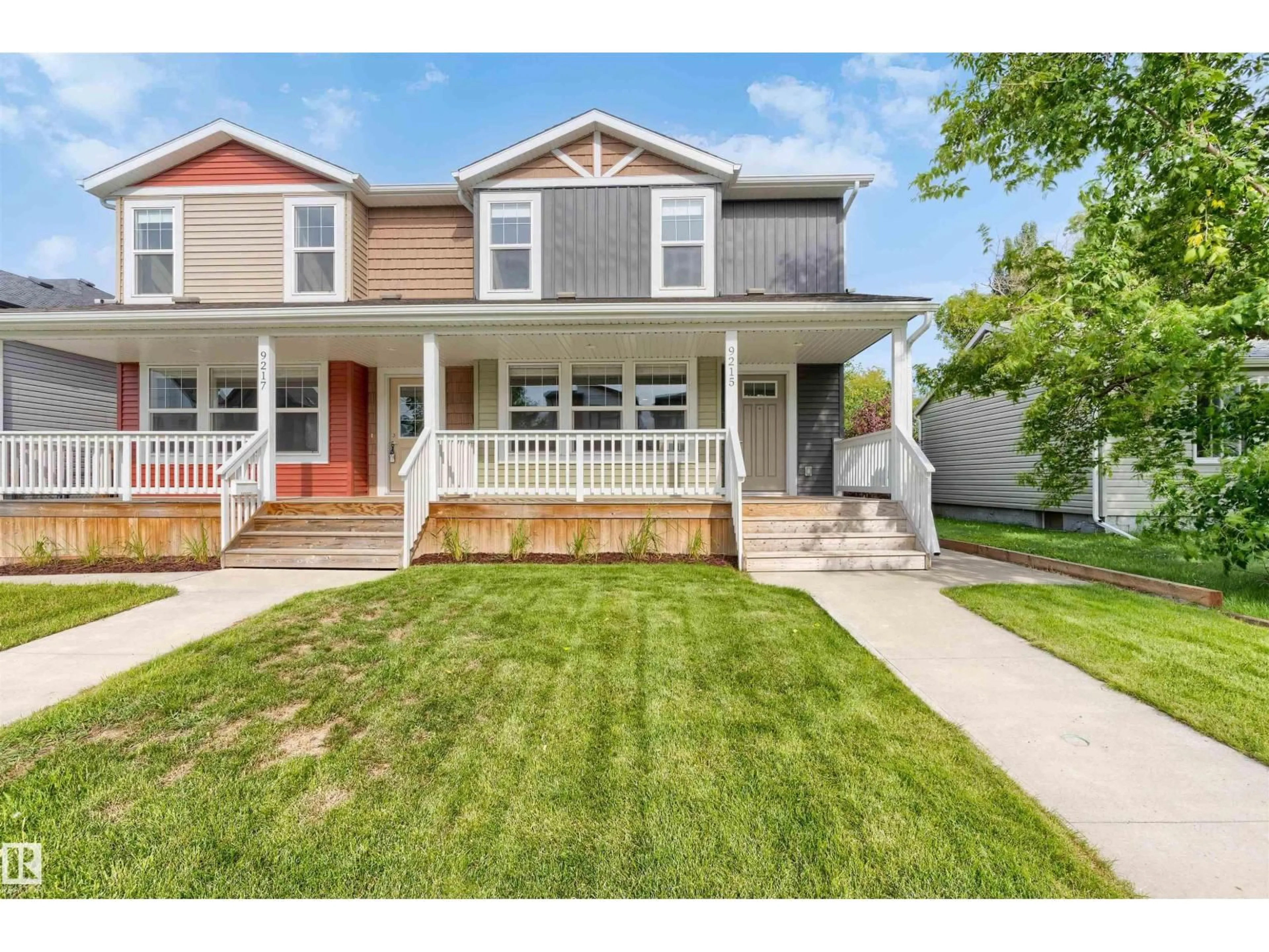 Home with vinyl exterior material, street for 9215 150 ST, Edmonton Alberta T5R1G4