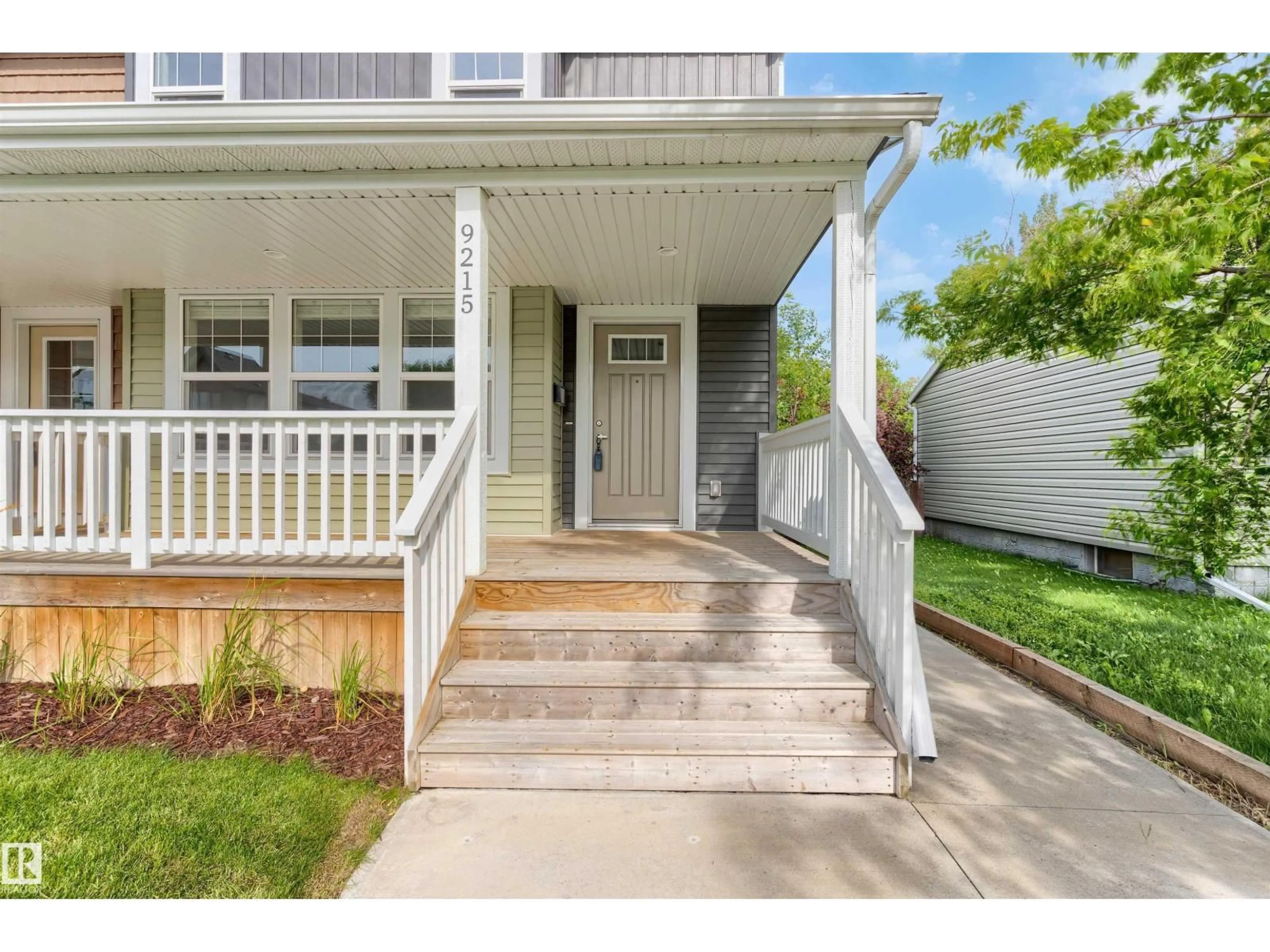 Home with vinyl exterior material, street for 9215 150 ST, Edmonton Alberta T5R1G4
