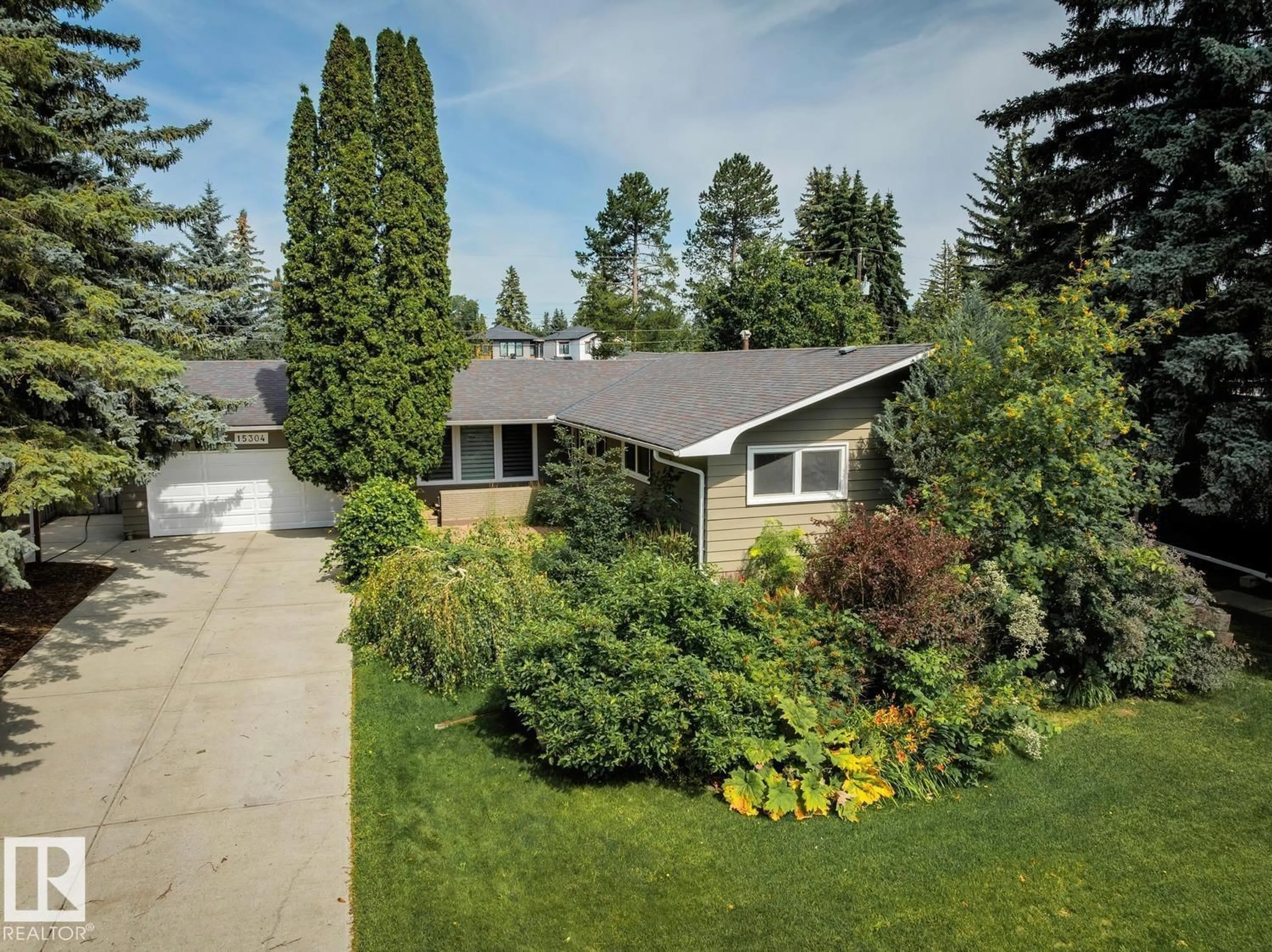 A pic from outside/outdoor area/front of a property/back of a property/a pic from drone, street for 15304 RIO TERRACE DR, Edmonton Alberta T5R5M5