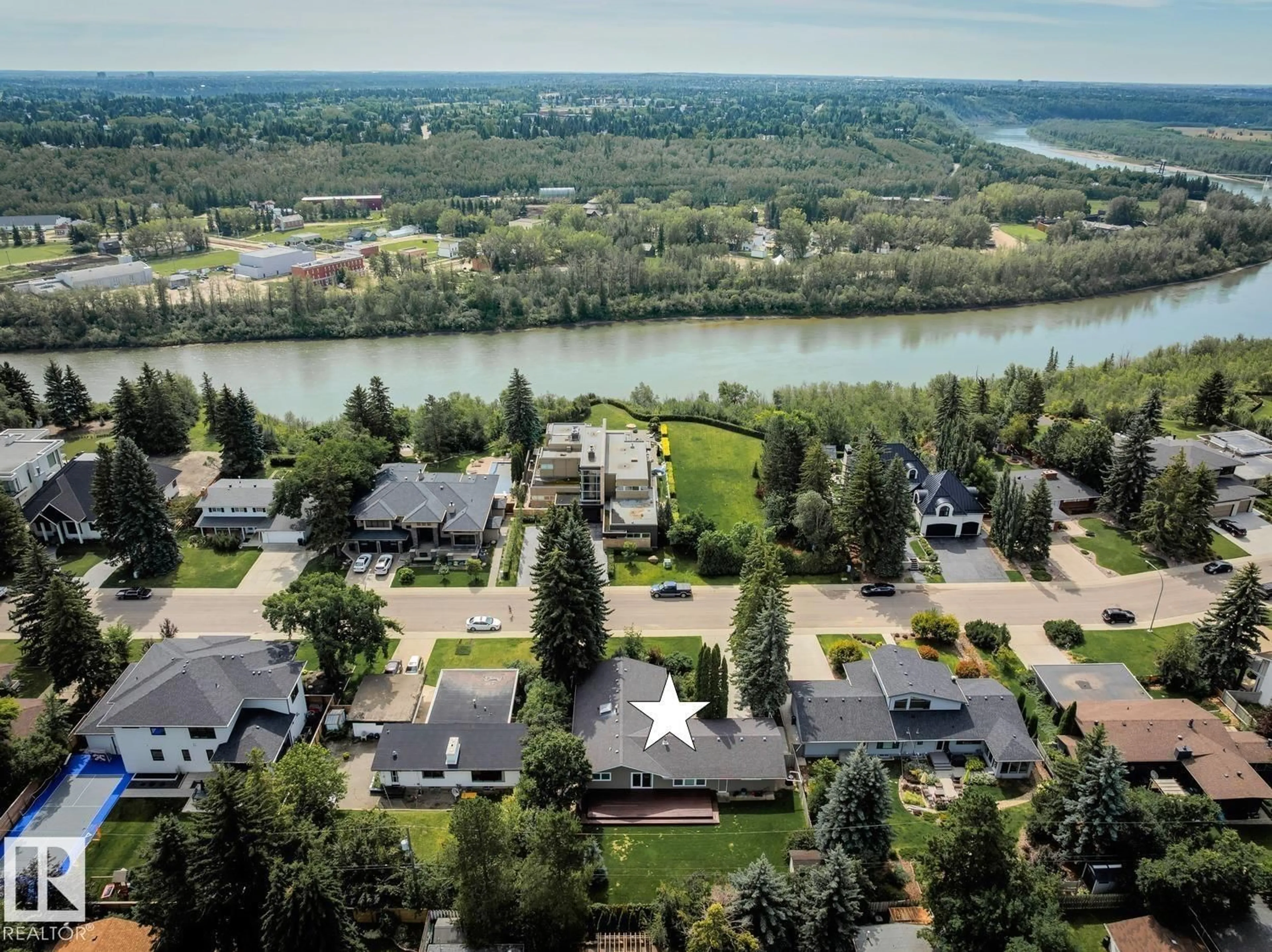 A pic from outside/outdoor area/front of a property/back of a property/a pic from drone, water/lake/river/ocean view for 15304 RIO TERRACE DR, Edmonton Alberta T5R5M5