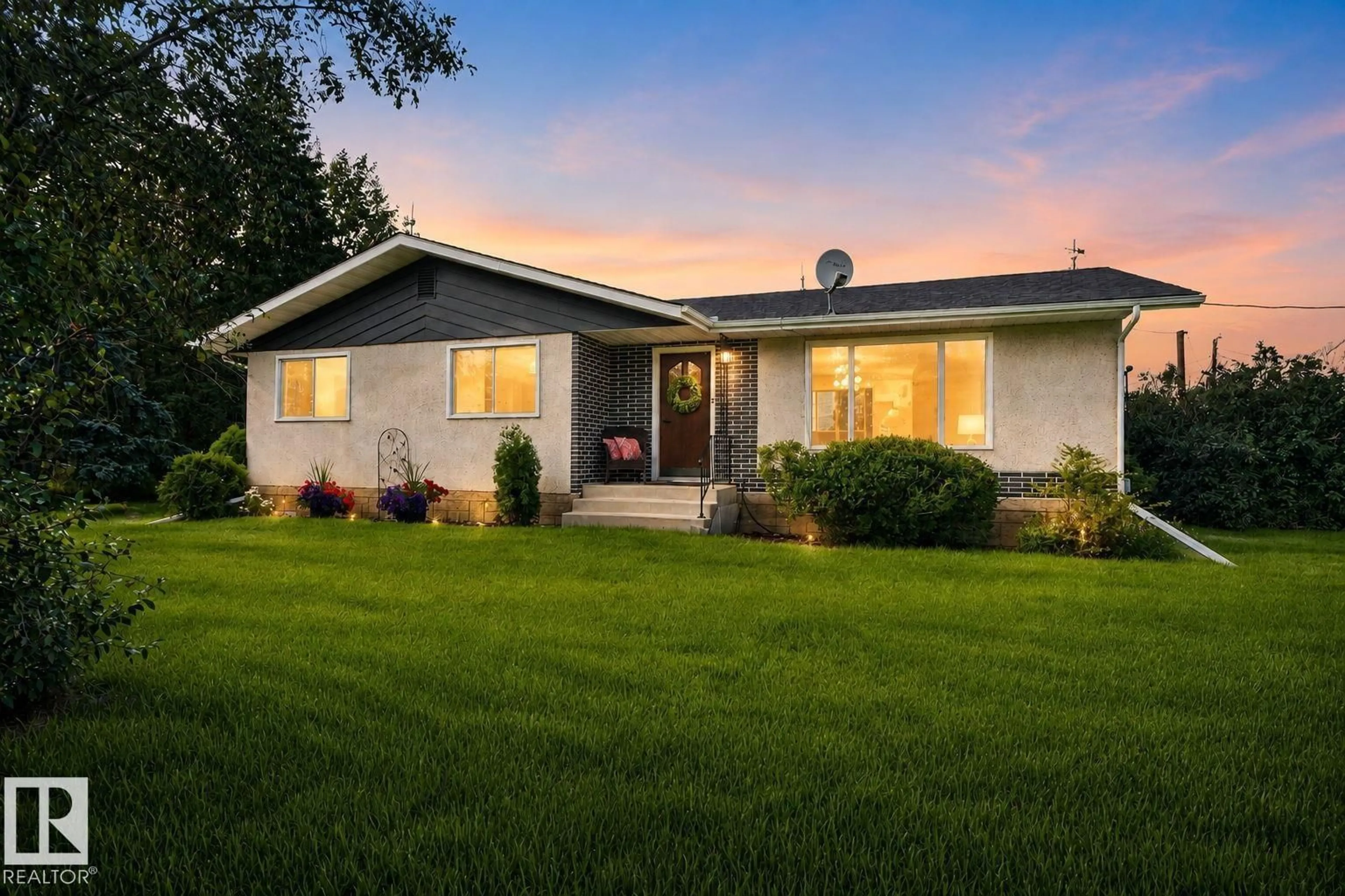 Home with vinyl exterior material, street for 58201 RR 214, Rural Thorhild County Alberta T0A2W0