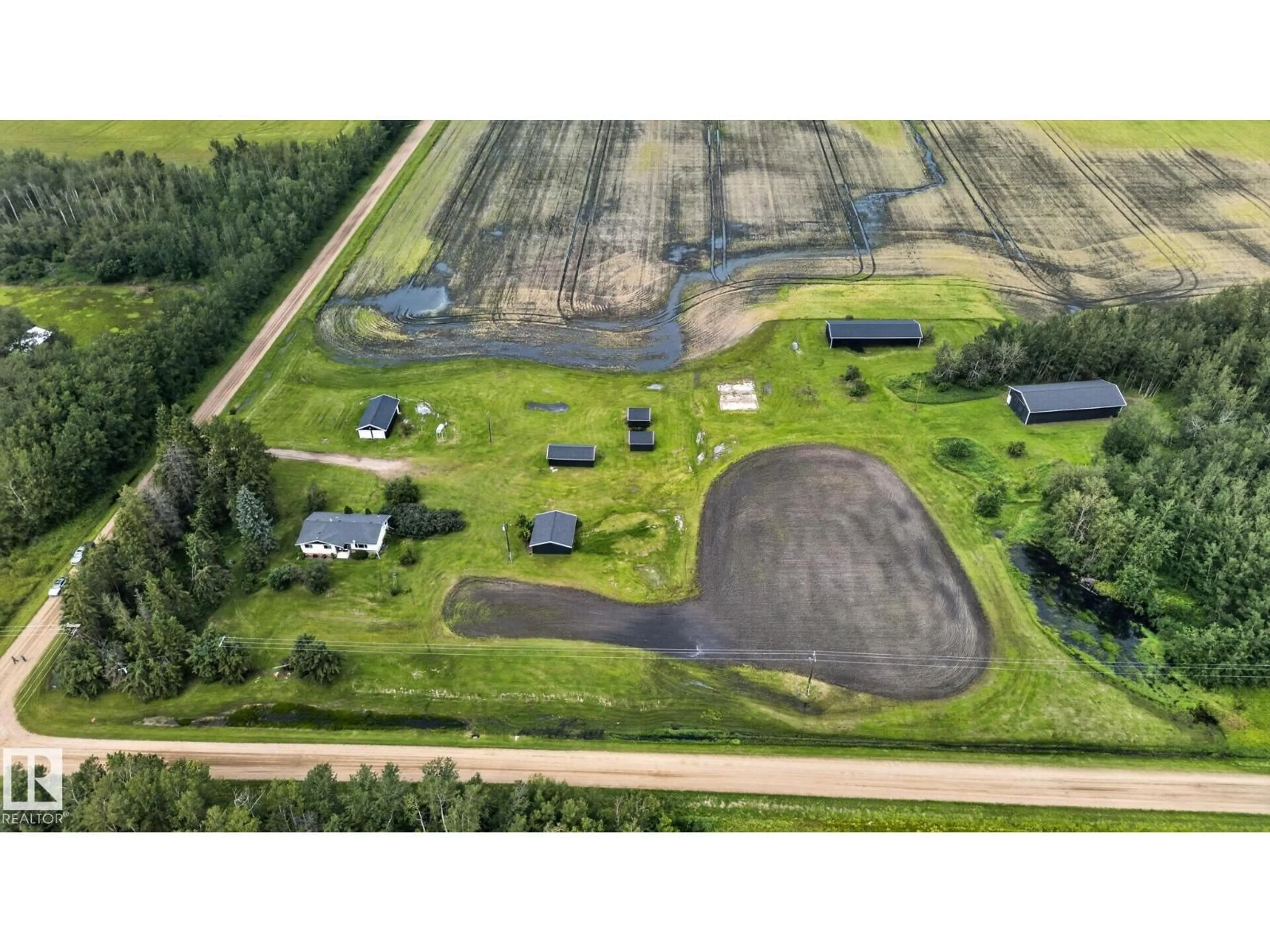 A pic from outside/outdoor area/front of a property/back of a property/a pic from drone, unknown for 58201 RR 214, Rural Thorhild County Alberta T0A2W0