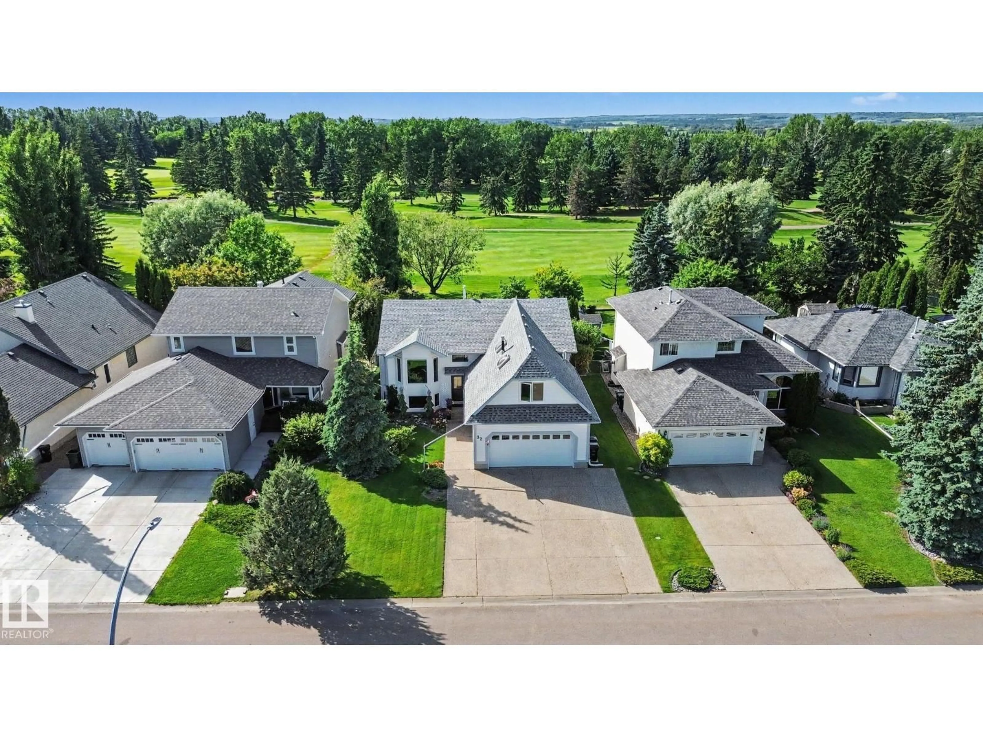 A pic from outside/outdoor area/front of a property/back of a property/a pic from drone, unknown for 32 FAIRWAY DR, Spruce Grove Alberta T7X3K3
