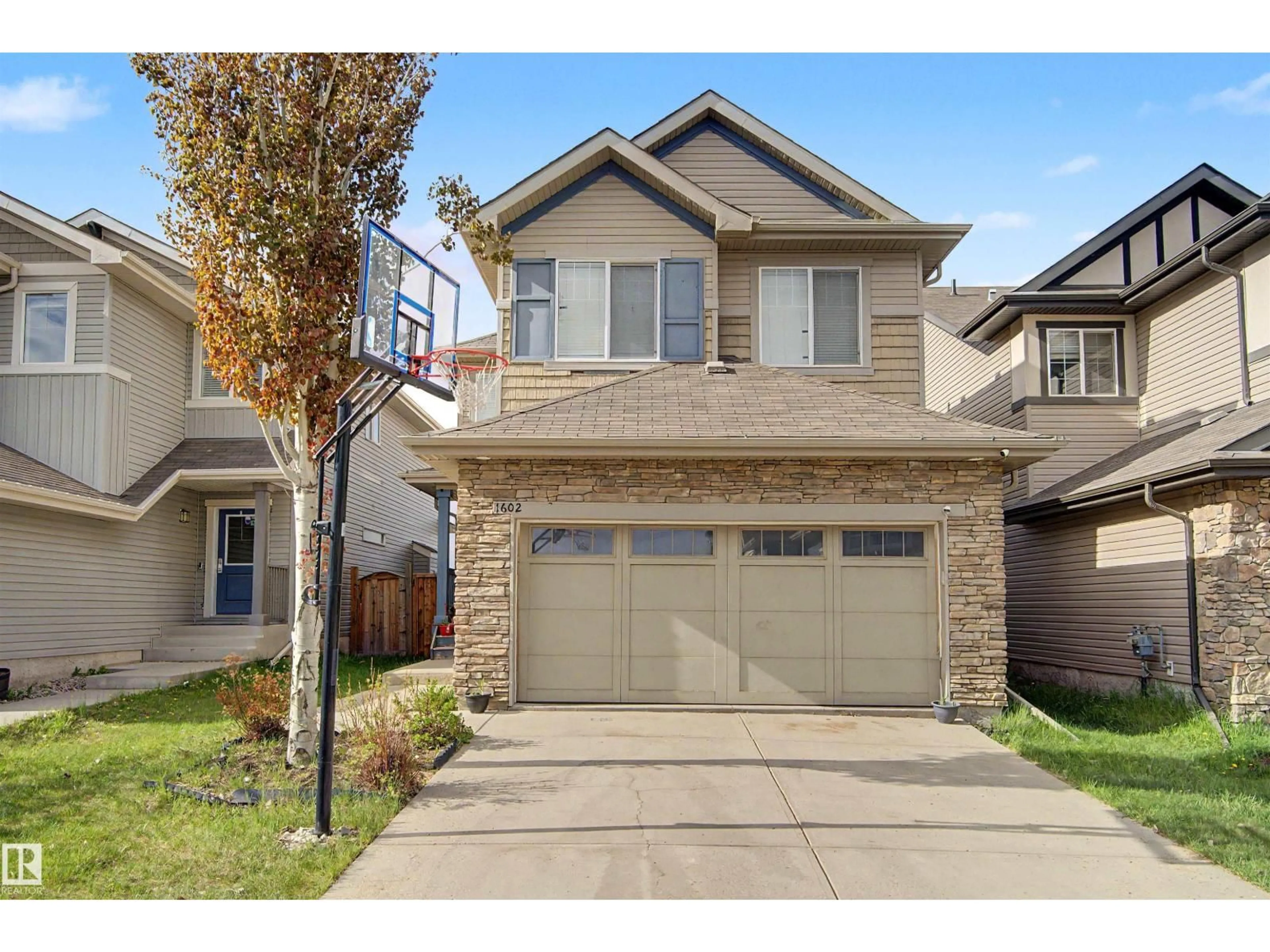 Home with brick exterior material, street for 1602 CHAPMAN WY, Edmonton Alberta T6W0Z2