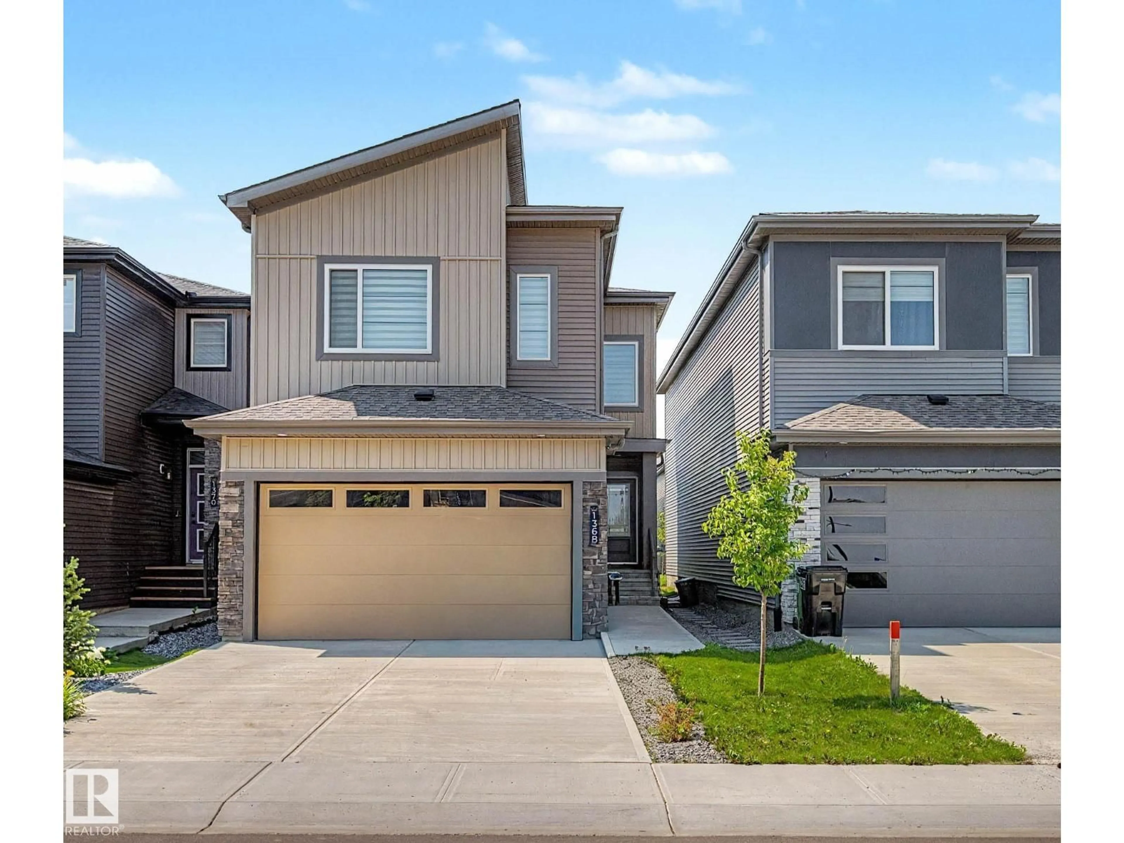 Home with vinyl exterior material, street for NW - 1368 SISKIN WD, Edmonton Alberta T5S0R3