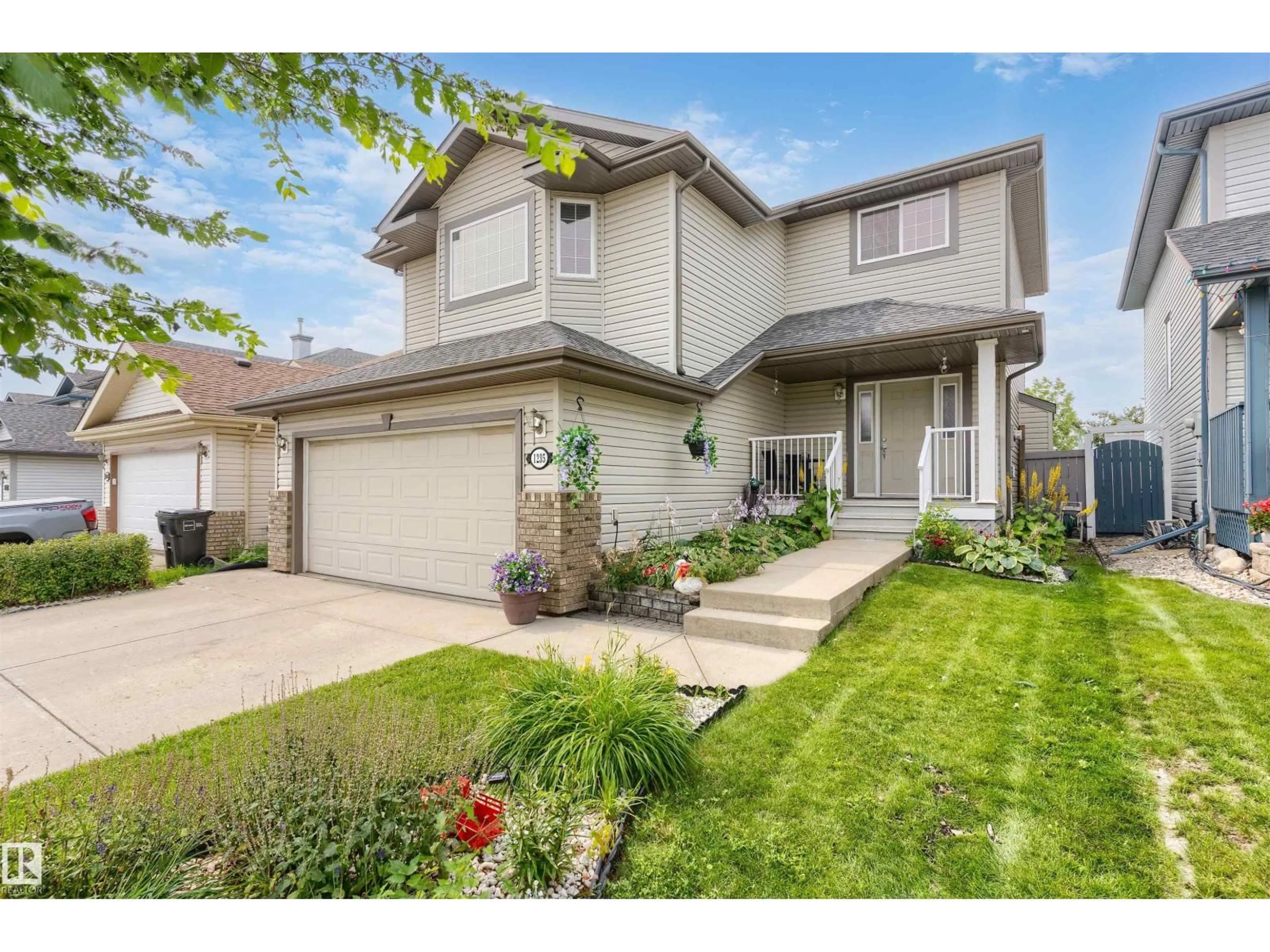 Home with vinyl exterior material, street for 1235 ORMSBY LN, Edmonton Alberta T5T6R2