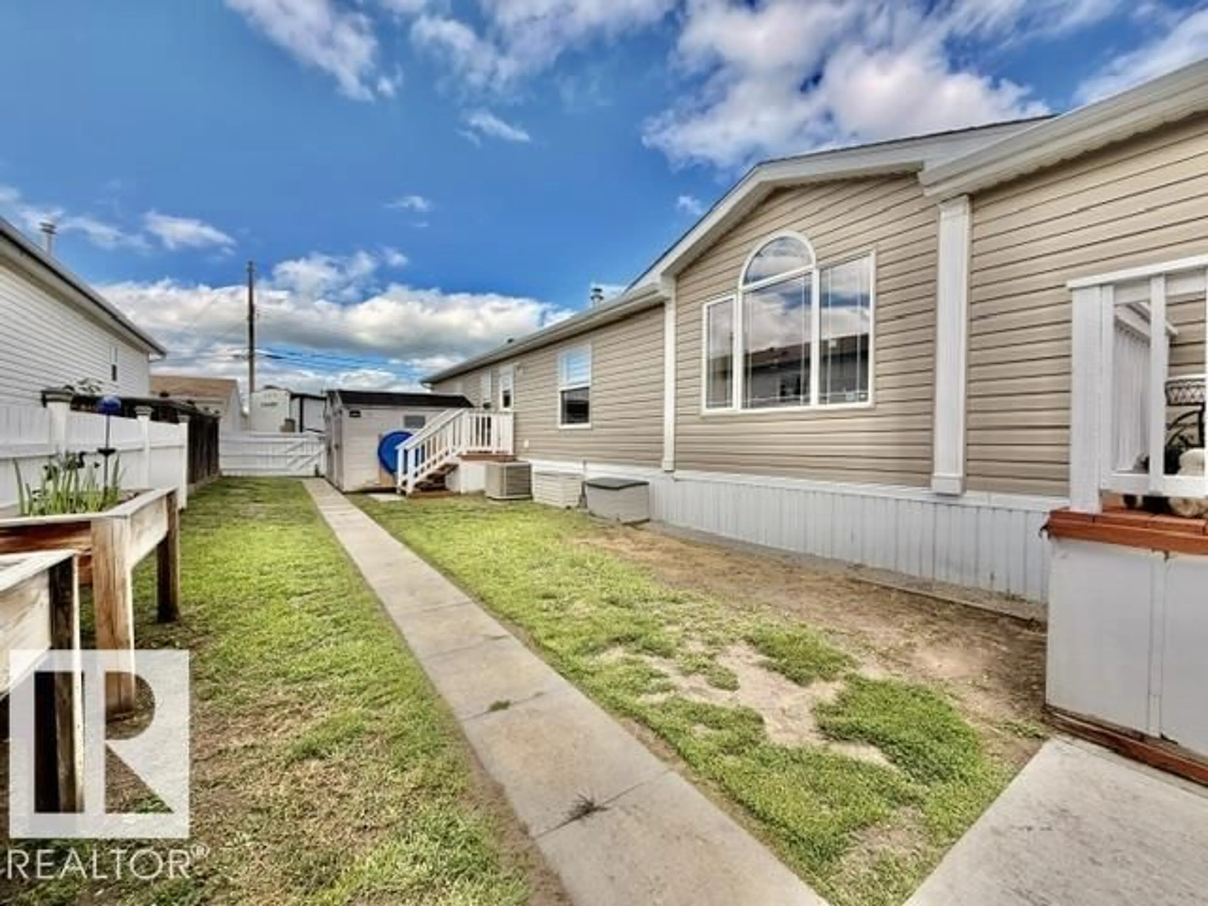 Home with vinyl exterior material, street for 4814 48 AV, Wetaskiwin Alberta T9A0E7