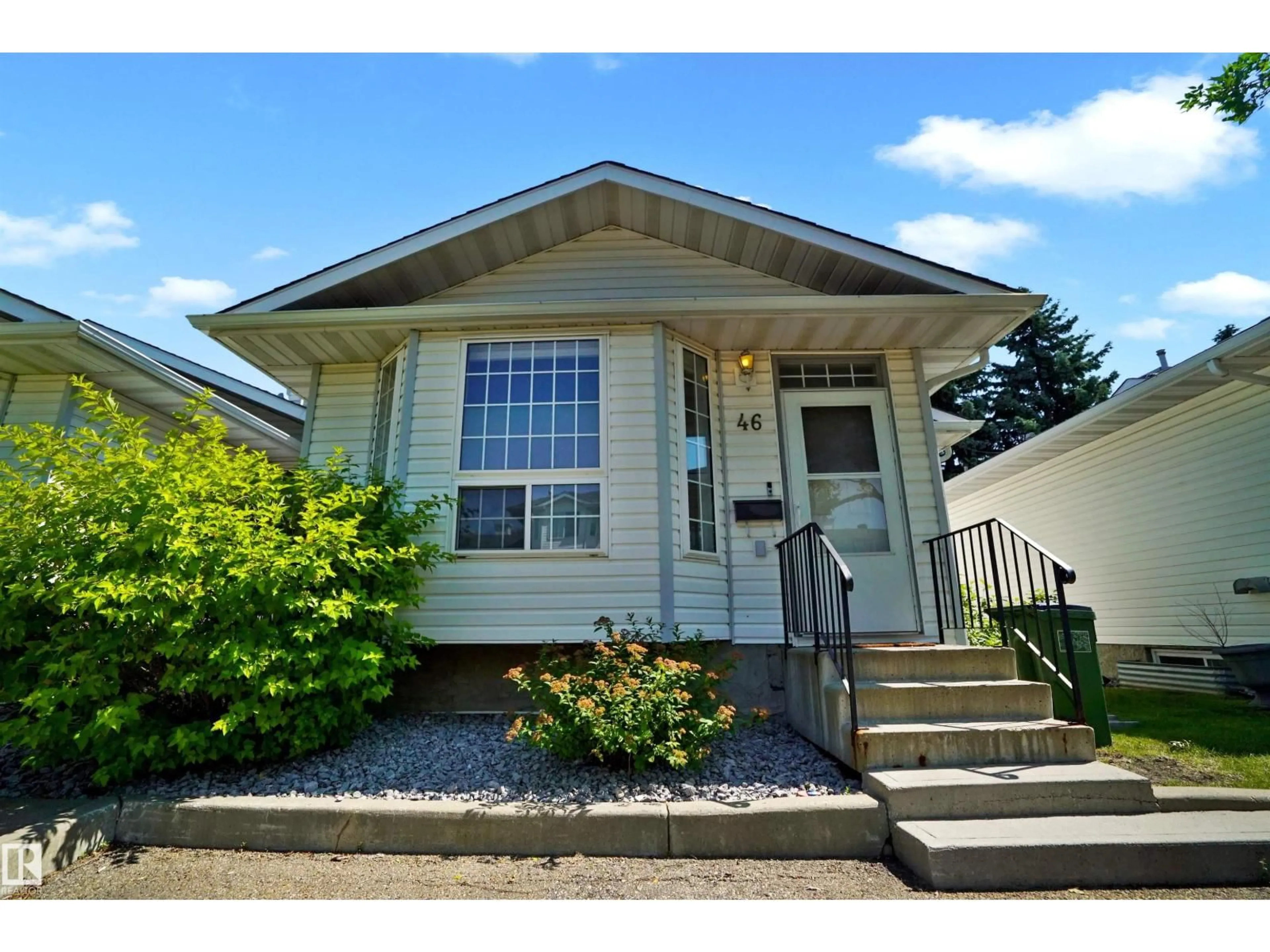 Home with vinyl exterior material, street for #46 - 3311 58 ST, Edmonton Alberta T6L6X3