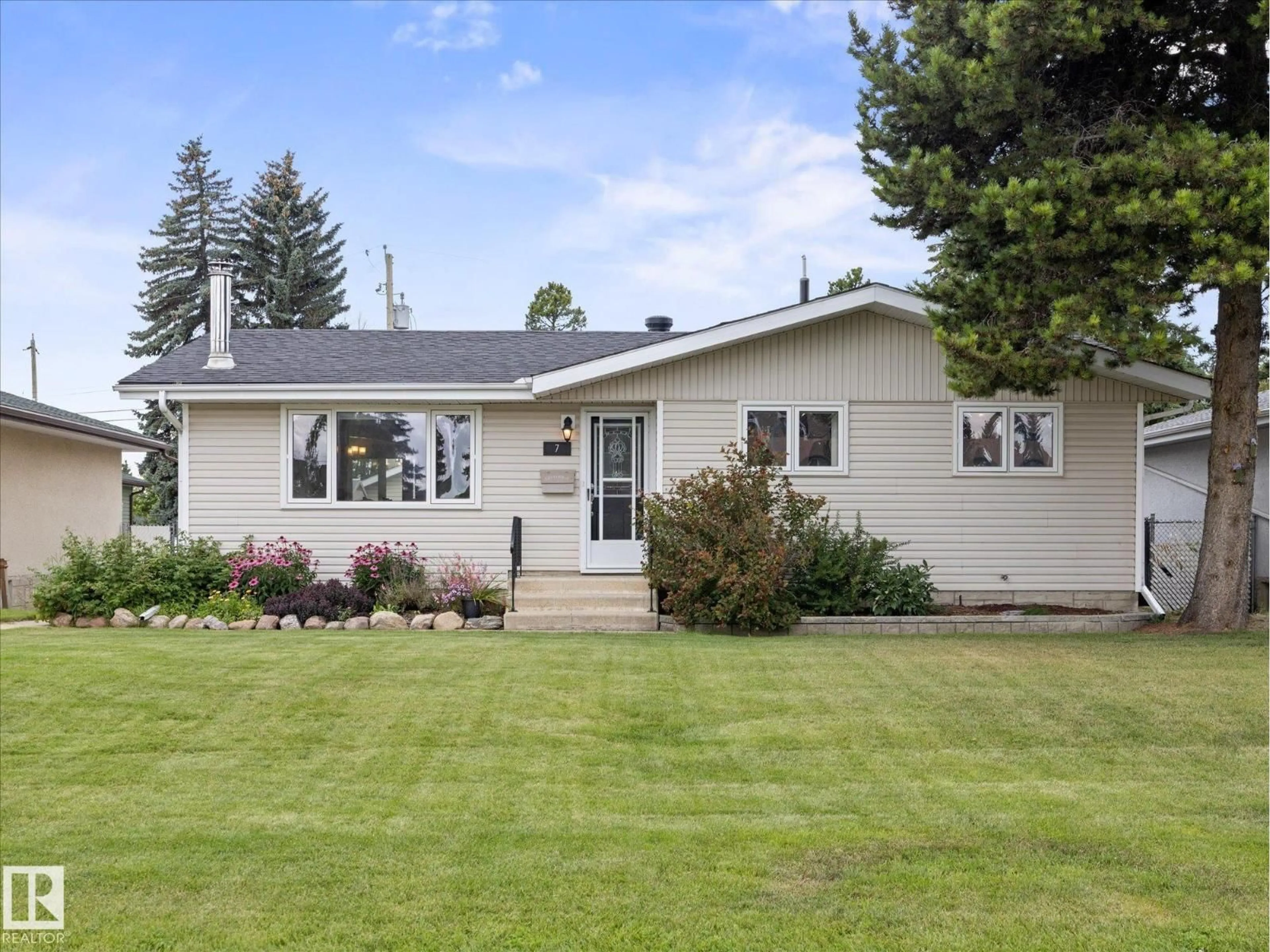 Home with vinyl exterior material, street for 7 CAMELOT AV, Leduc Alberta T9E4M4