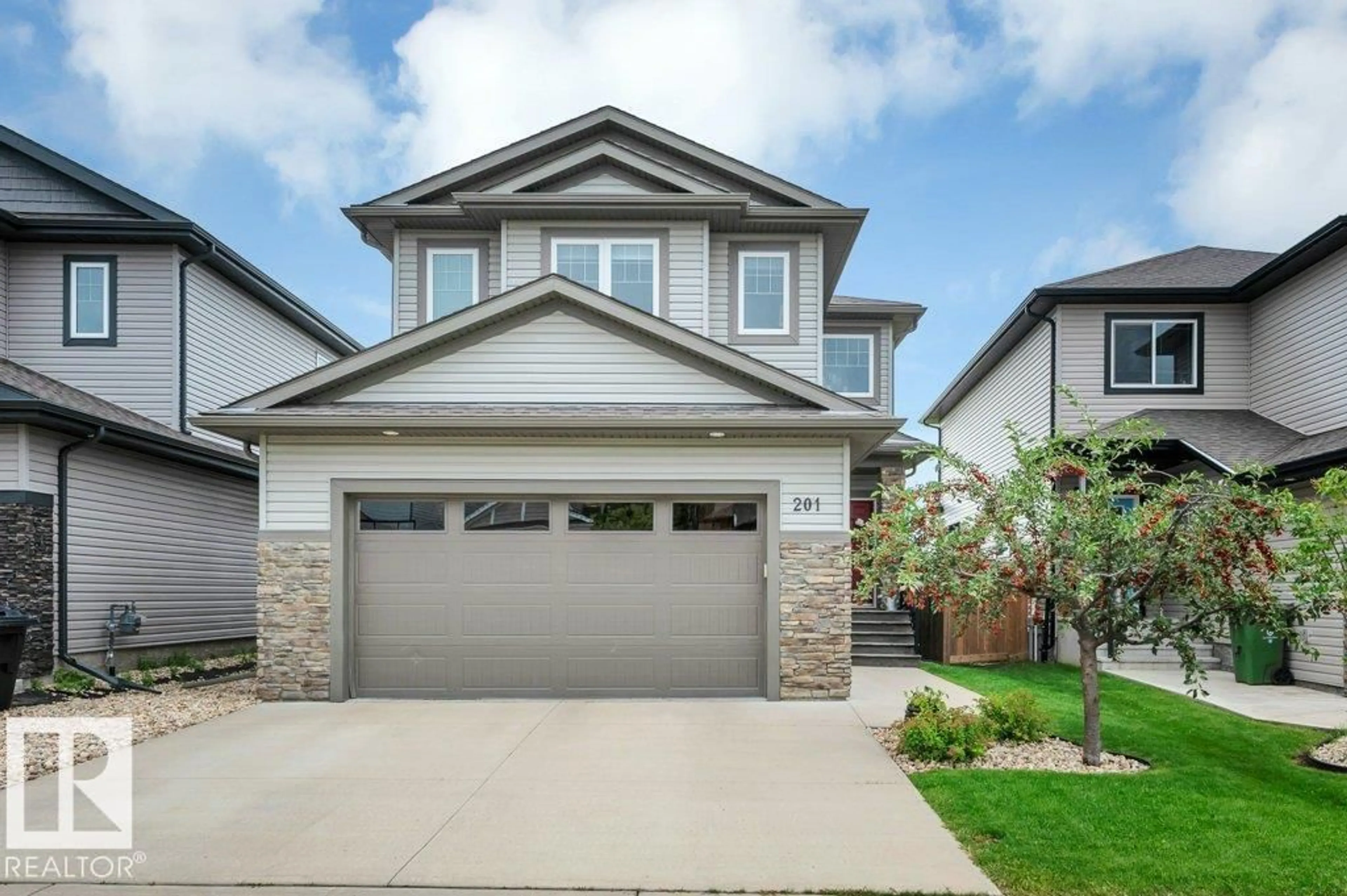 Home with vinyl exterior material, street for 201 WESTBROOK WD, Fort Saskatchewan Alberta T8L0L7