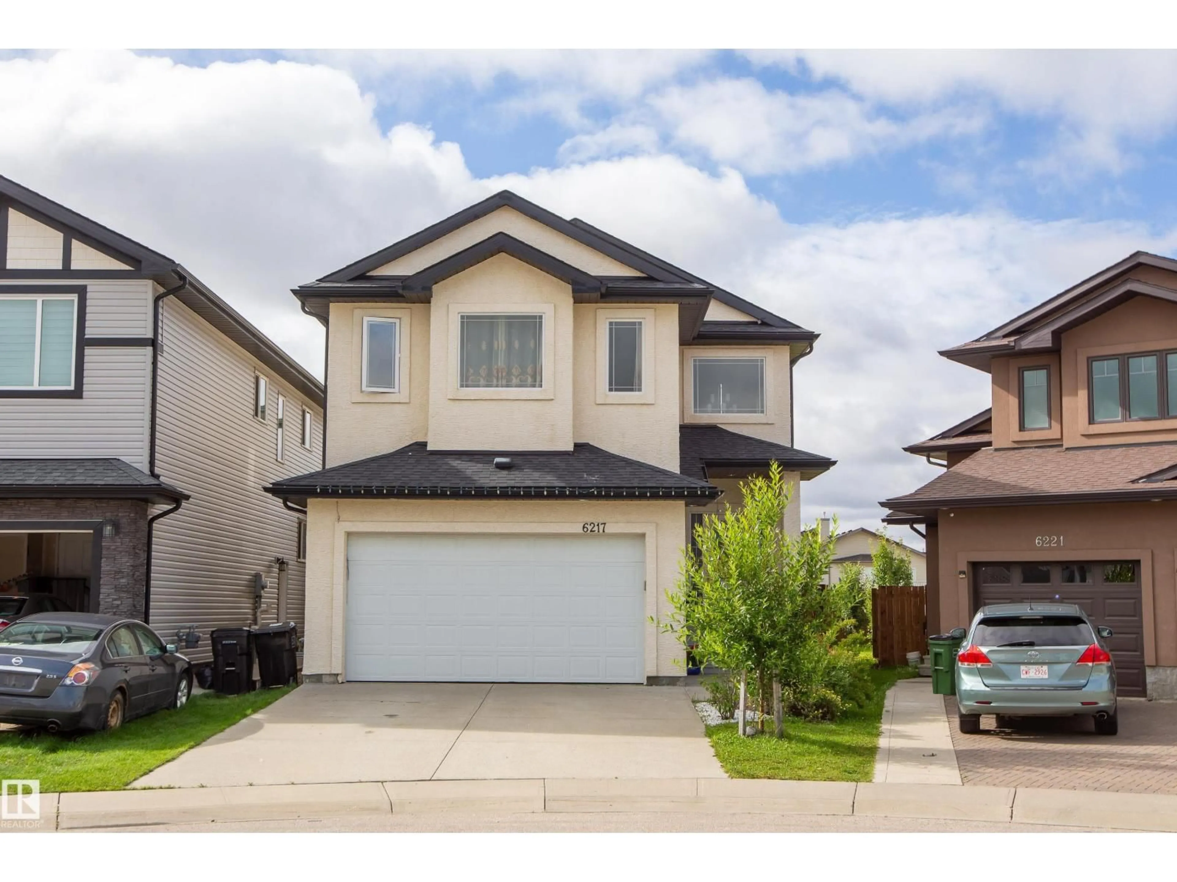 Home with vinyl exterior material, street for 6217 167A AVENUE, Edmonton Alberta T5Y3M8