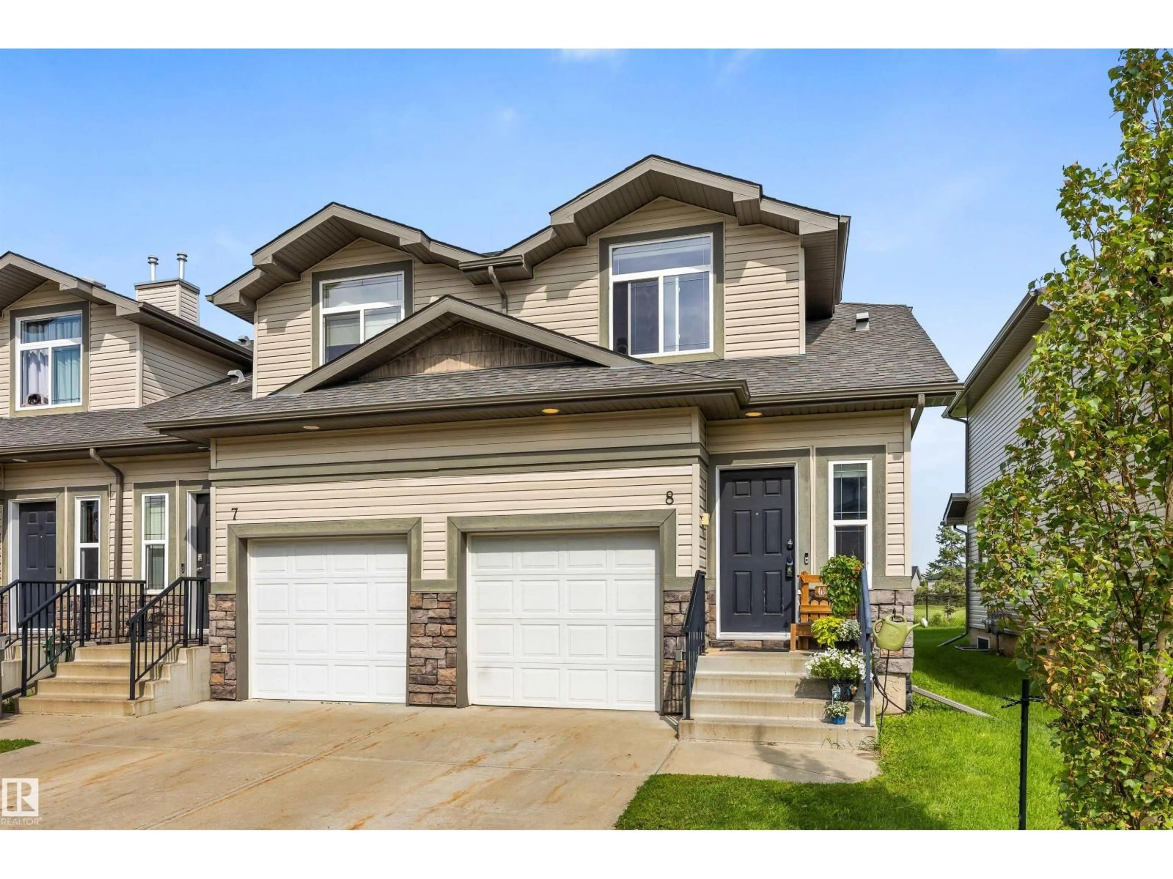 Home with vinyl exterior material, street for #8 - 9511 102 AV, Morinville Alberta T8R0C6