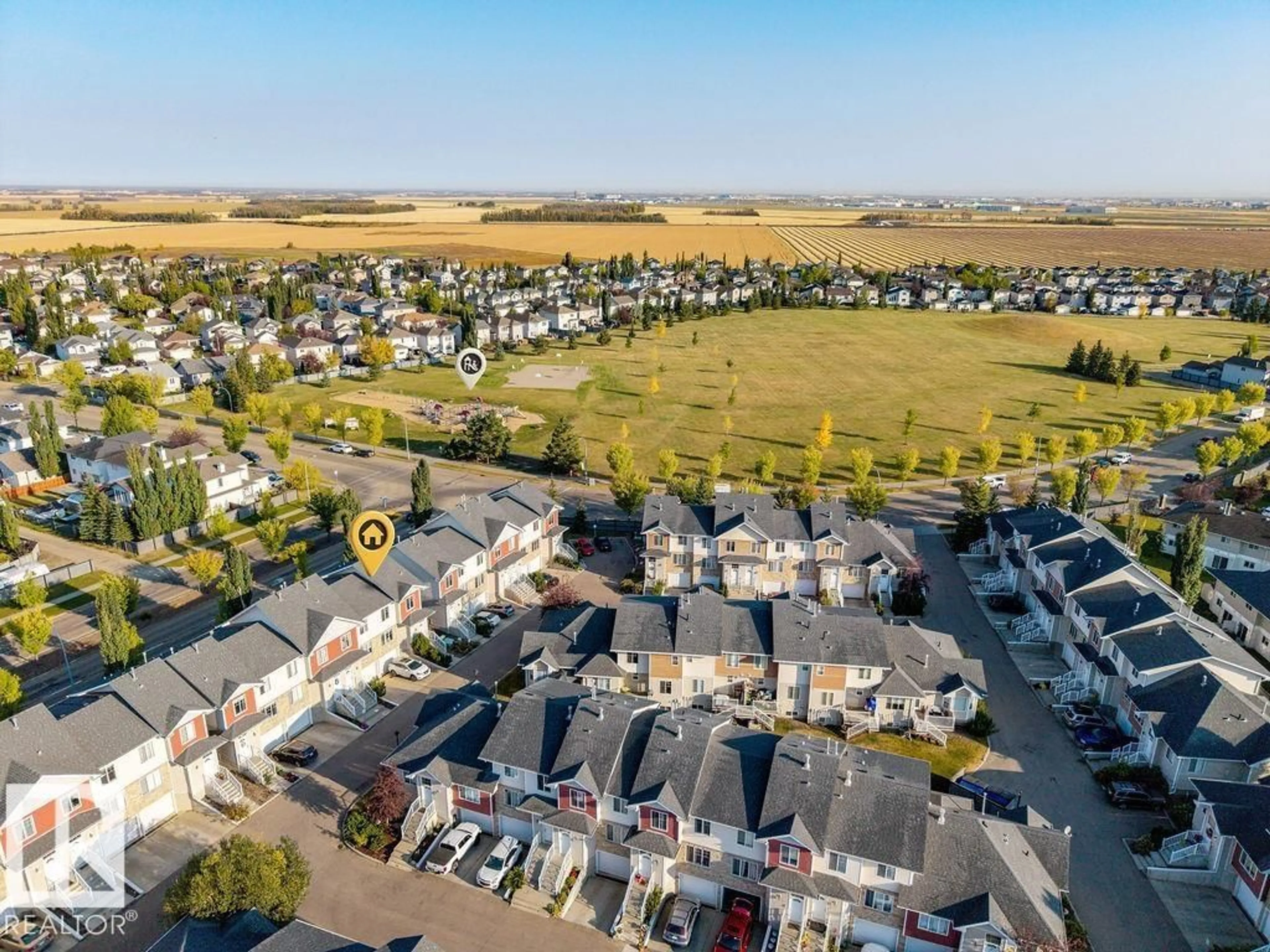 A pic from outside/outdoor area/front of a property/back of a property/a pic from drone, mountain view for 178 - 405 BRIDGEPORT BV, Leduc Alberta T9E8S8