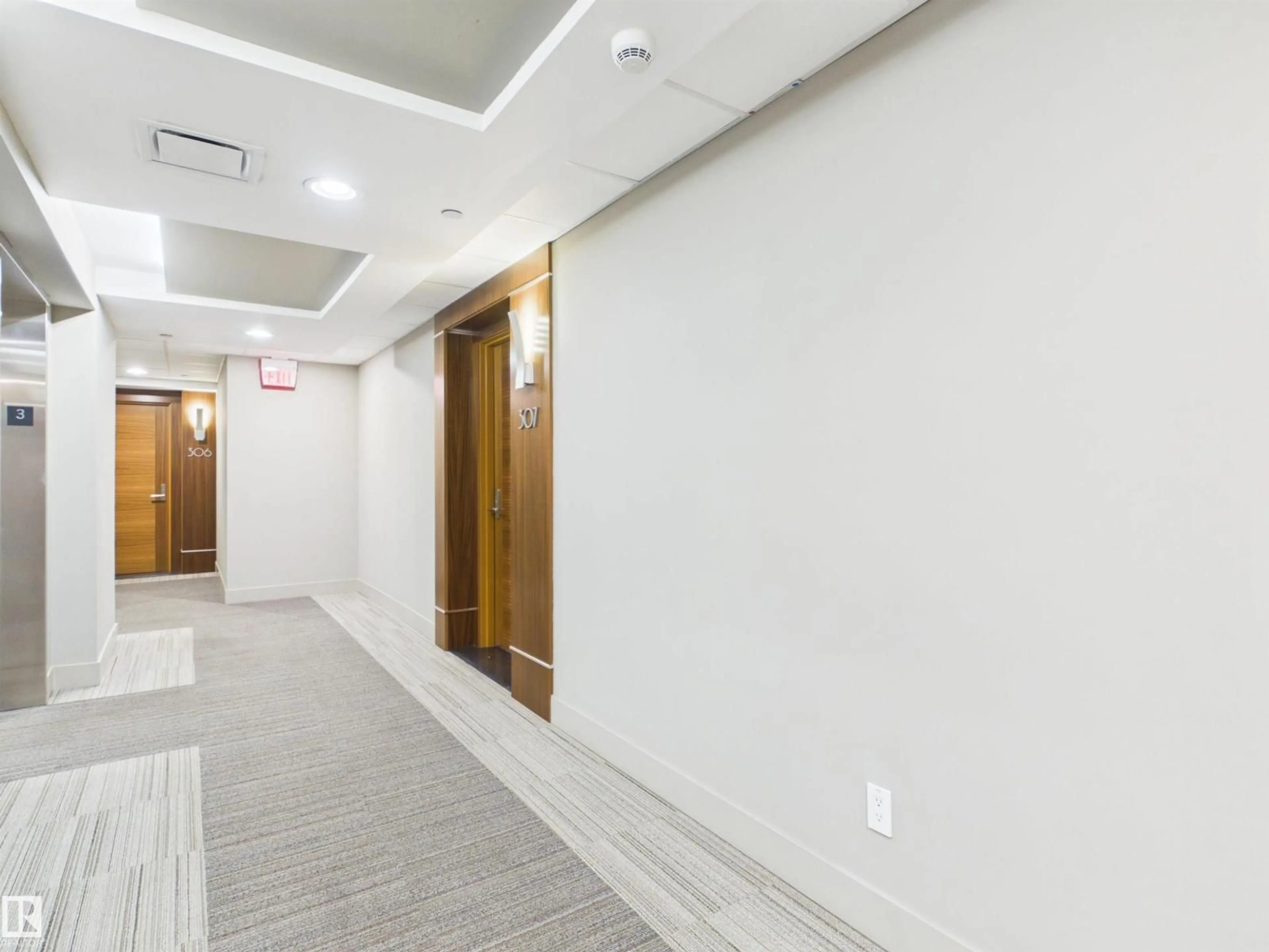 Indoor foyer for 307 - 11969 JASPER AV, Edmonton Alberta T5K0P1