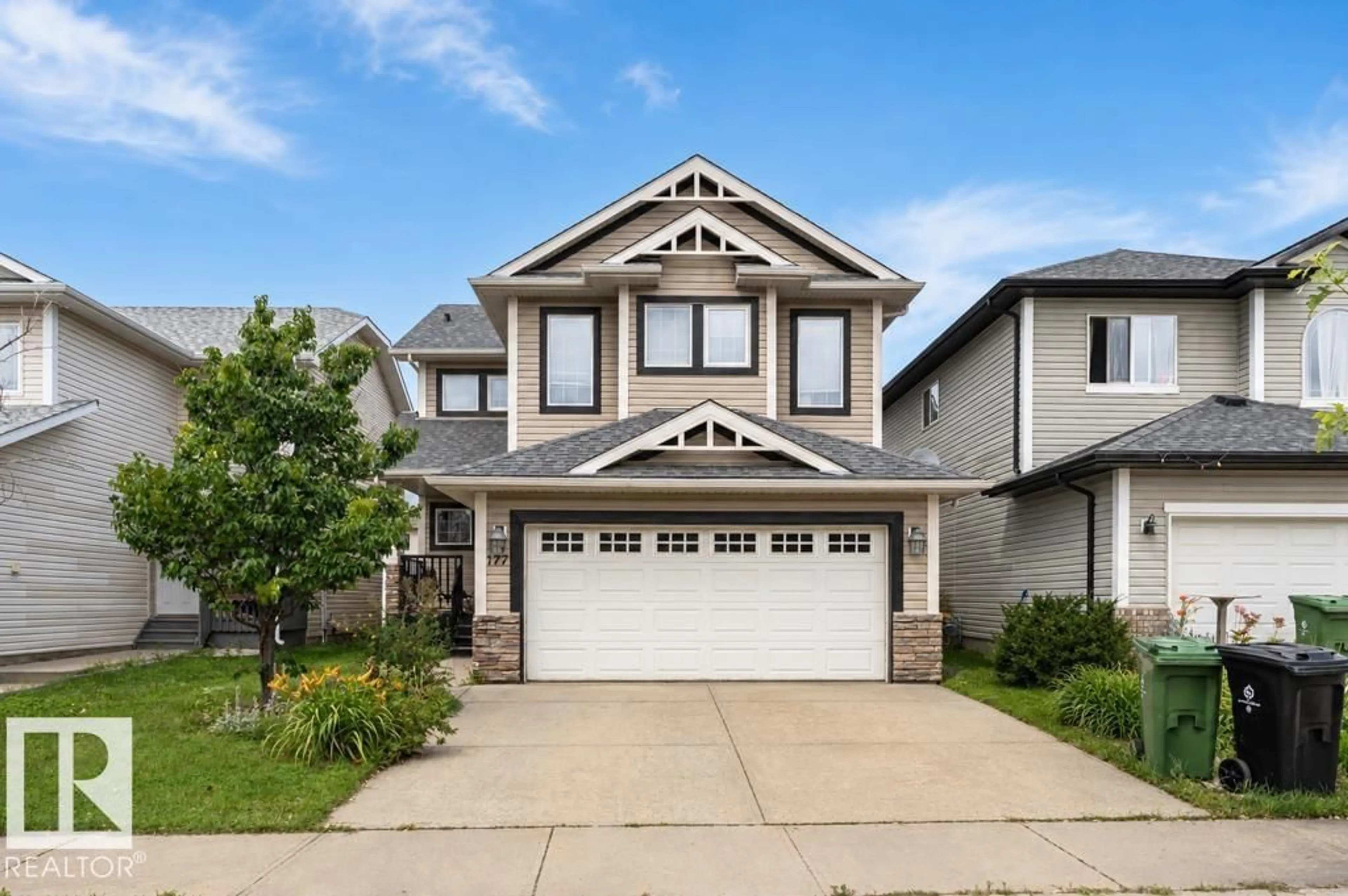 Home with vinyl exterior material, street for 177 WOODBEND WY, Fort Saskatchewan Alberta T8L4S4