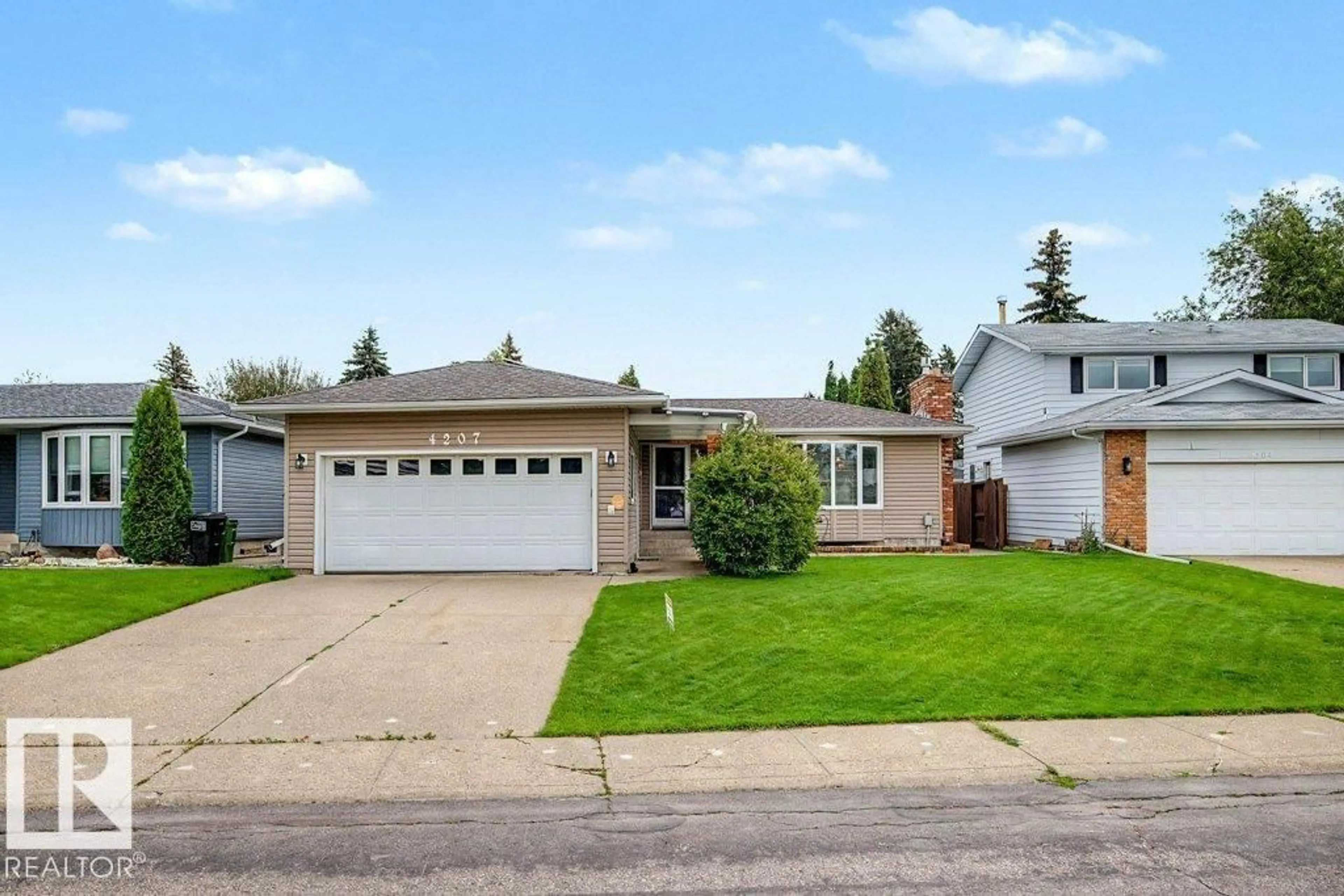 Home with vinyl exterior material, street for NW - 4207 109 A ST, Edmonton Alberta T6J2R7