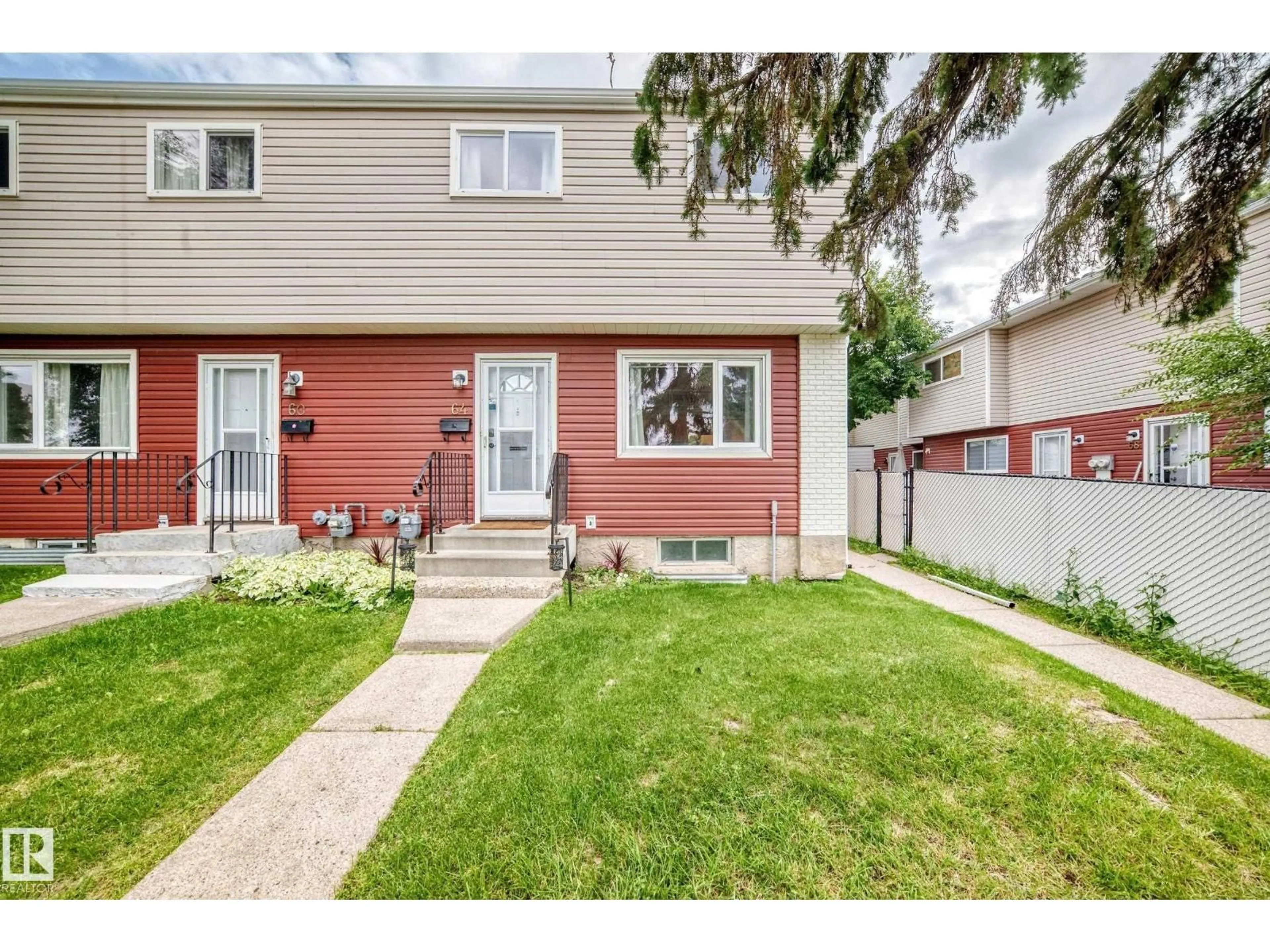 Home with vinyl exterior material, street for 64 HABITAT CR, Edmonton Alberta T5A2X7
