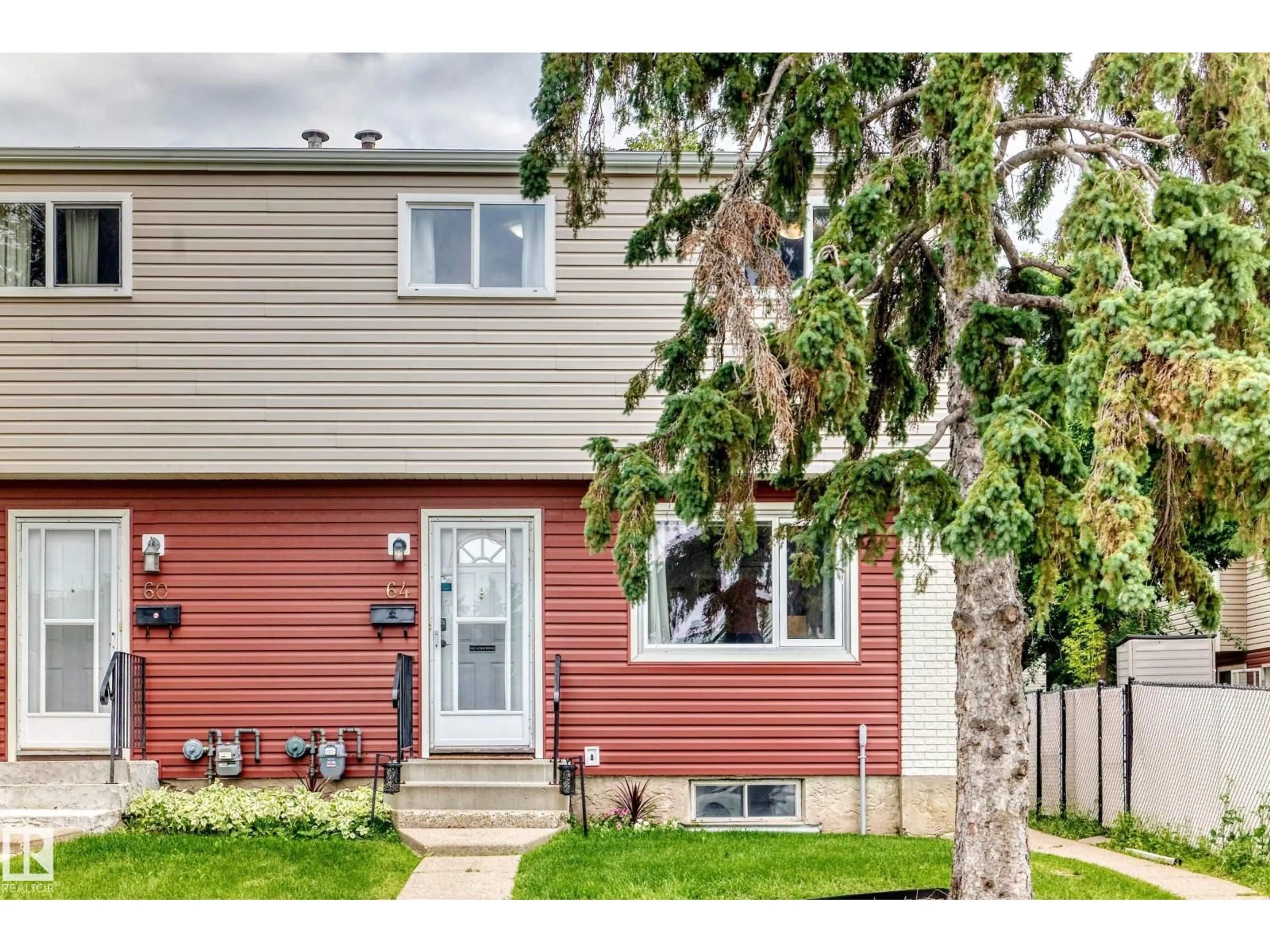 Home with vinyl exterior material, street for 64 HABITAT CR, Edmonton Alberta T5A2X7