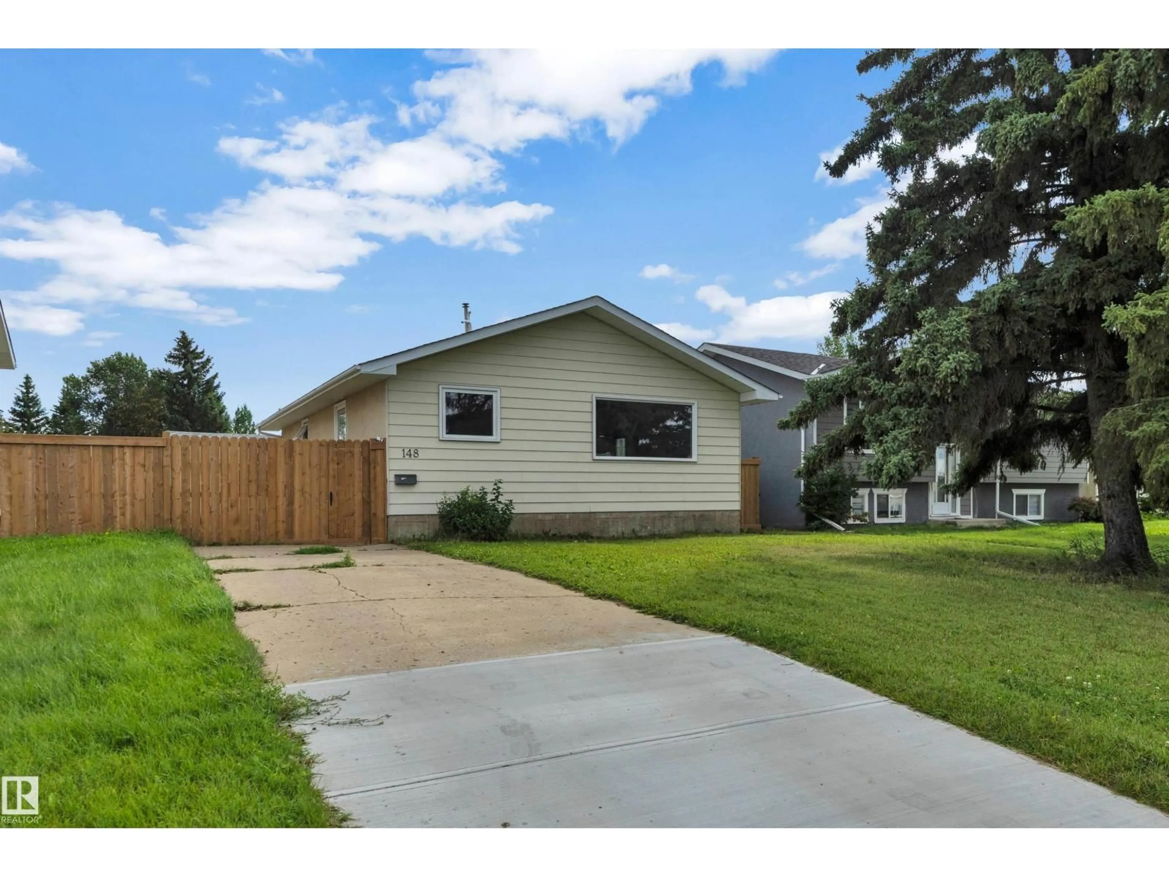 Home with vinyl exterior material, street for 148 CORINTHIA DR, Leduc Alberta T9E4G3