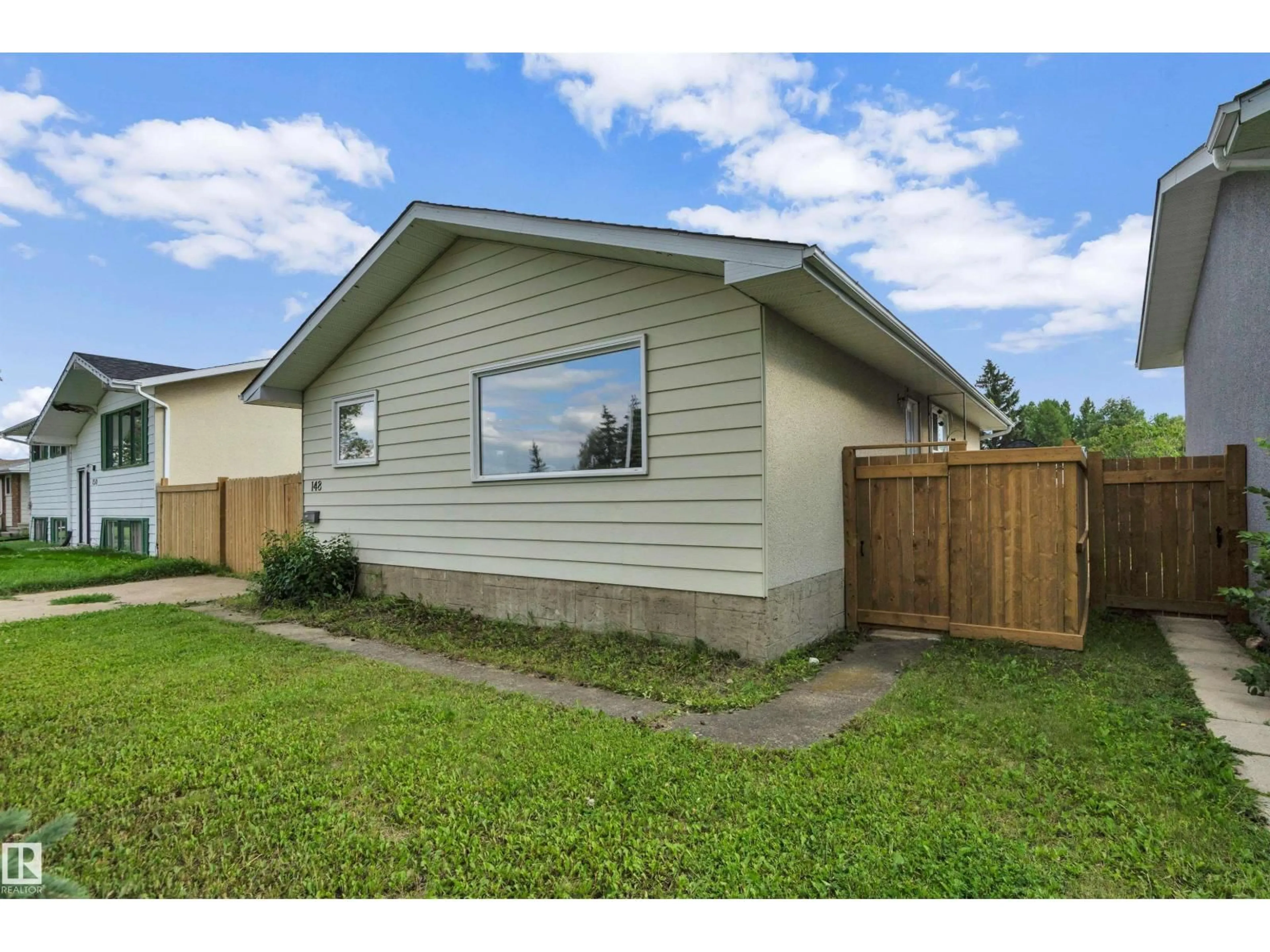 Home with vinyl exterior material, street for 148 CORINTHIA DR, Leduc Alberta T9E4G3