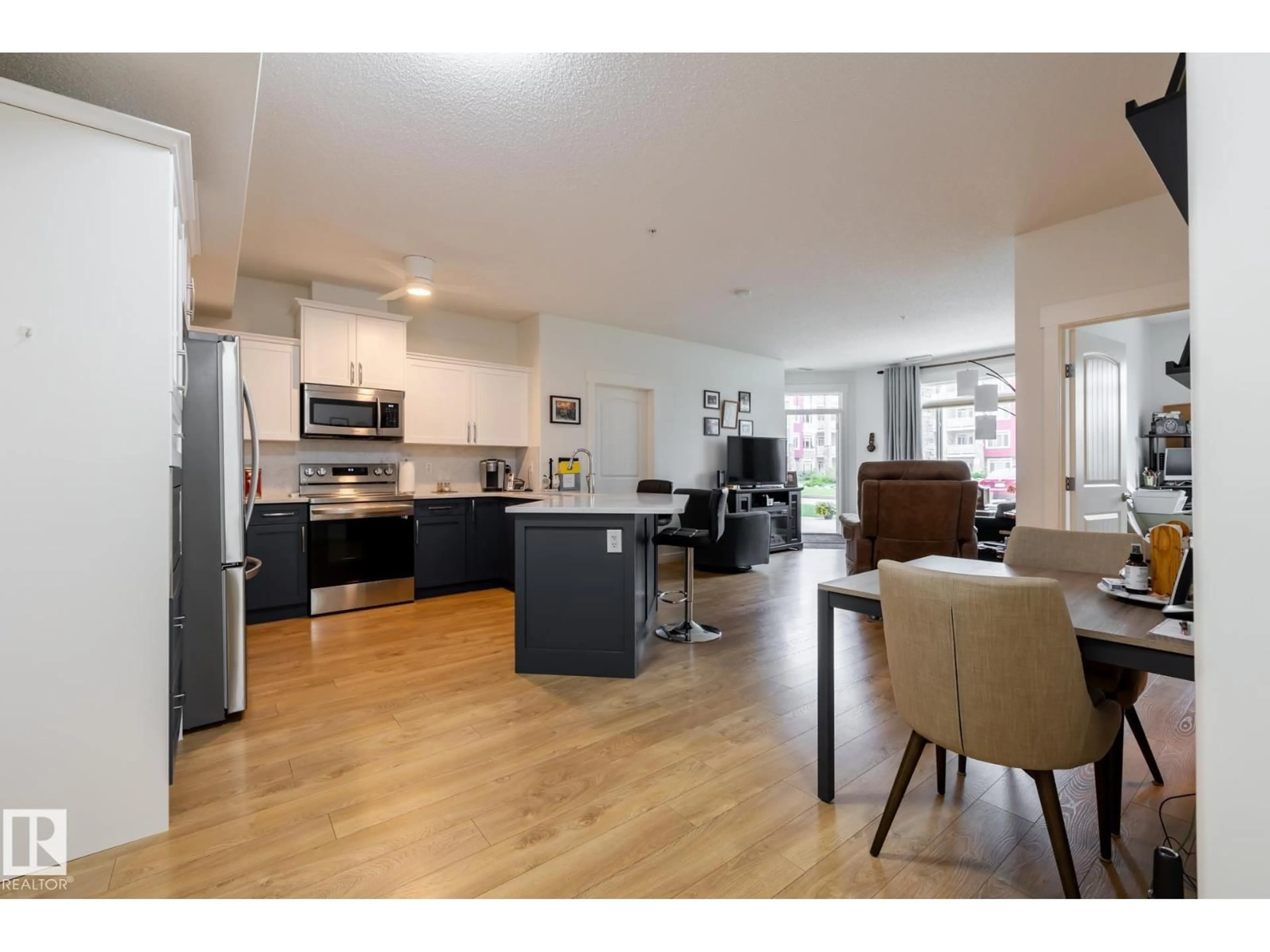 Open concept kitchen, wood/laminate floor for #133 - 511 QUEEN ST, Spruce Grove Alberta T7X0G4