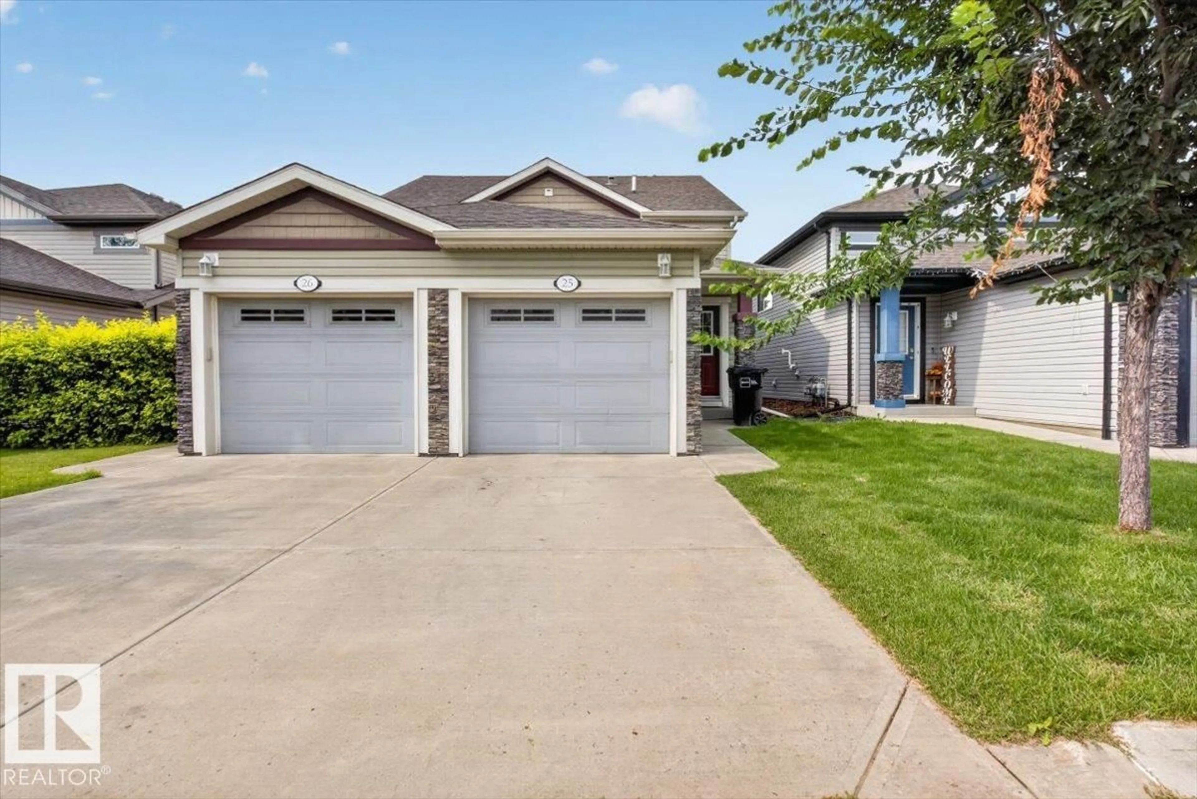 Home with vinyl exterior material, street for #25 - 6520 2 AV SW, Edmonton Alberta T6X1S4