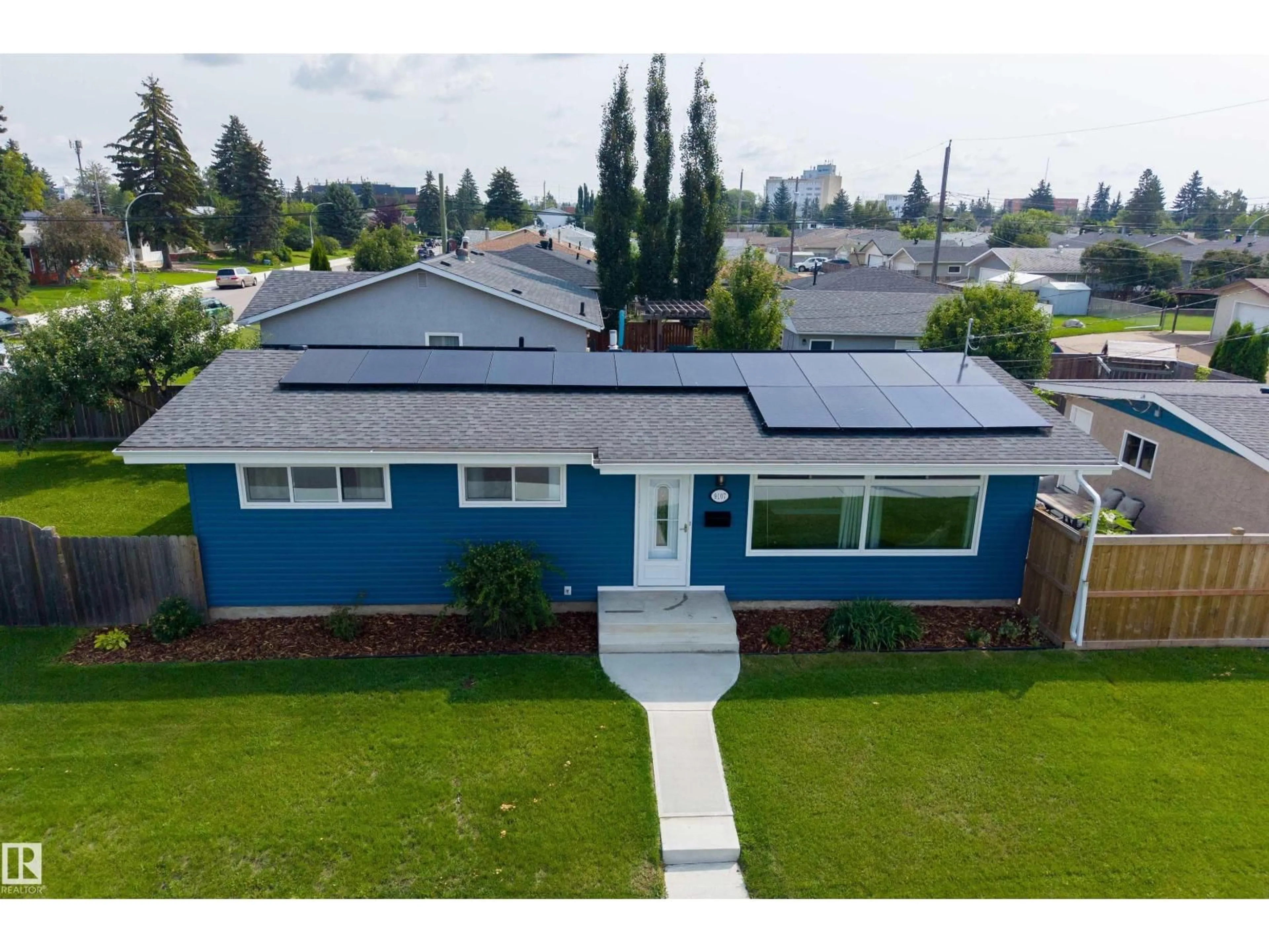 A pic from outside/outdoor area/front of a property/back of a property/a pic from drone, street for 9107 58 ST, Edmonton Alberta T6B1L3
