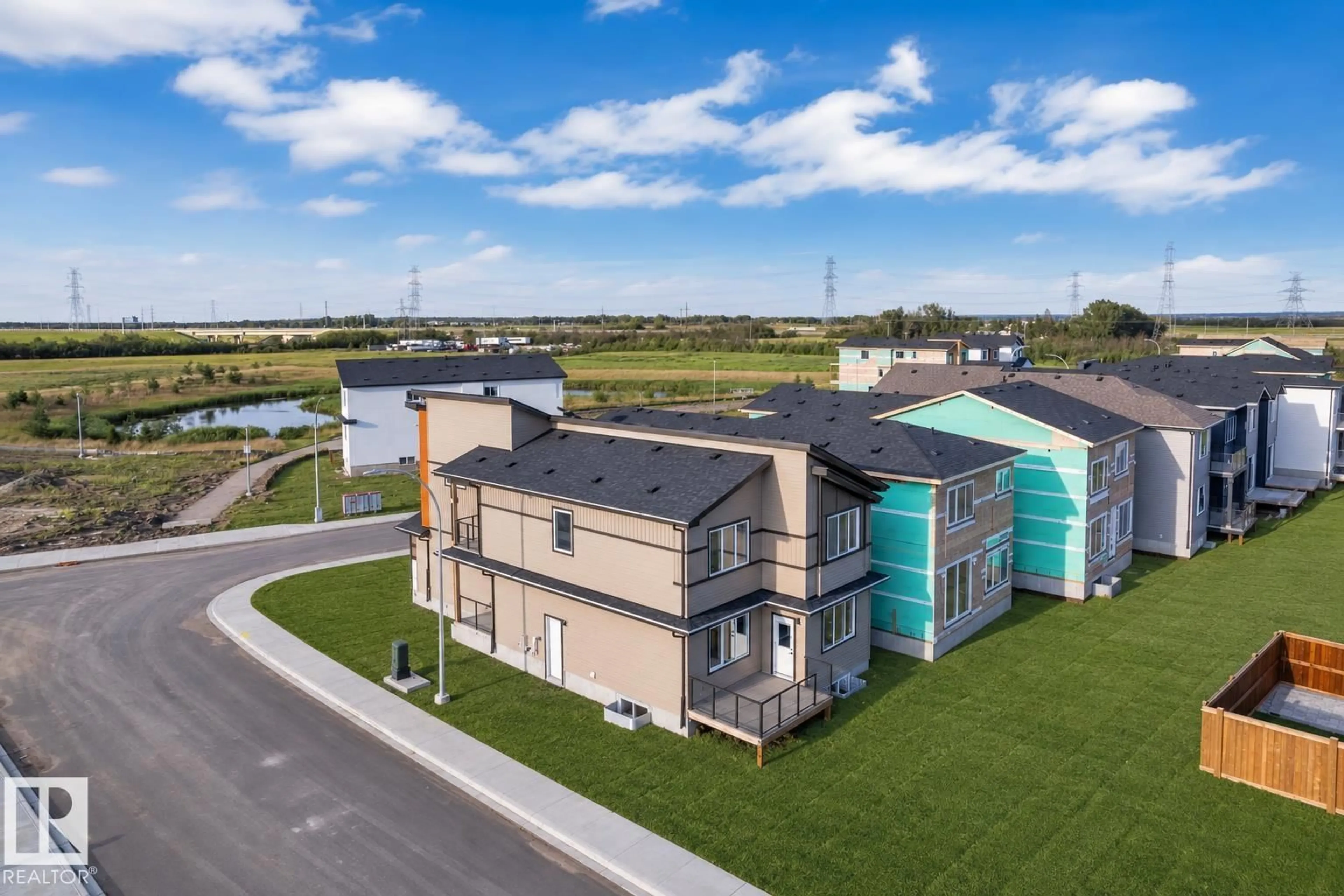 A pic from outside/outdoor area/front of a property/back of a property/a pic from drone, building for 2039 156 AV, Edmonton Alberta T5Y4N3