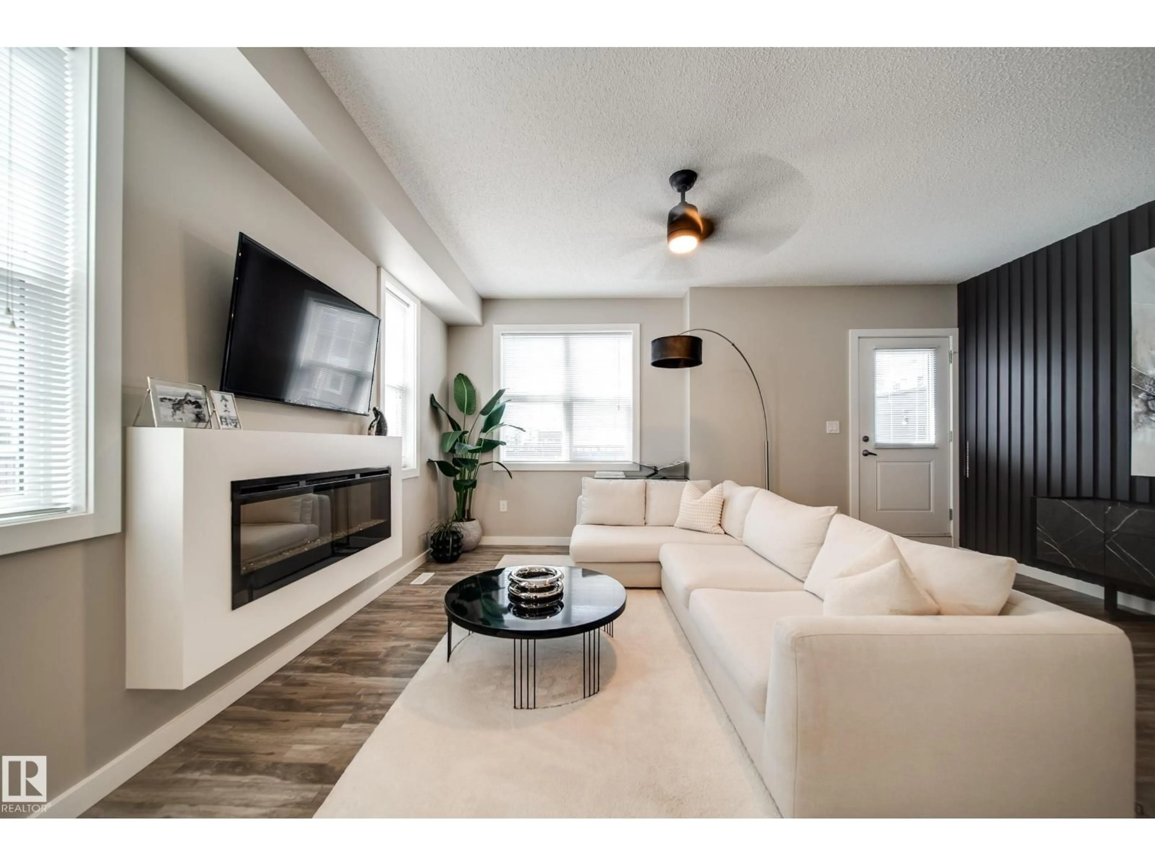 Living room with furniture, unknown for 2803 JAMES MOWATT TR, Edmonton Alberta T6W2P5