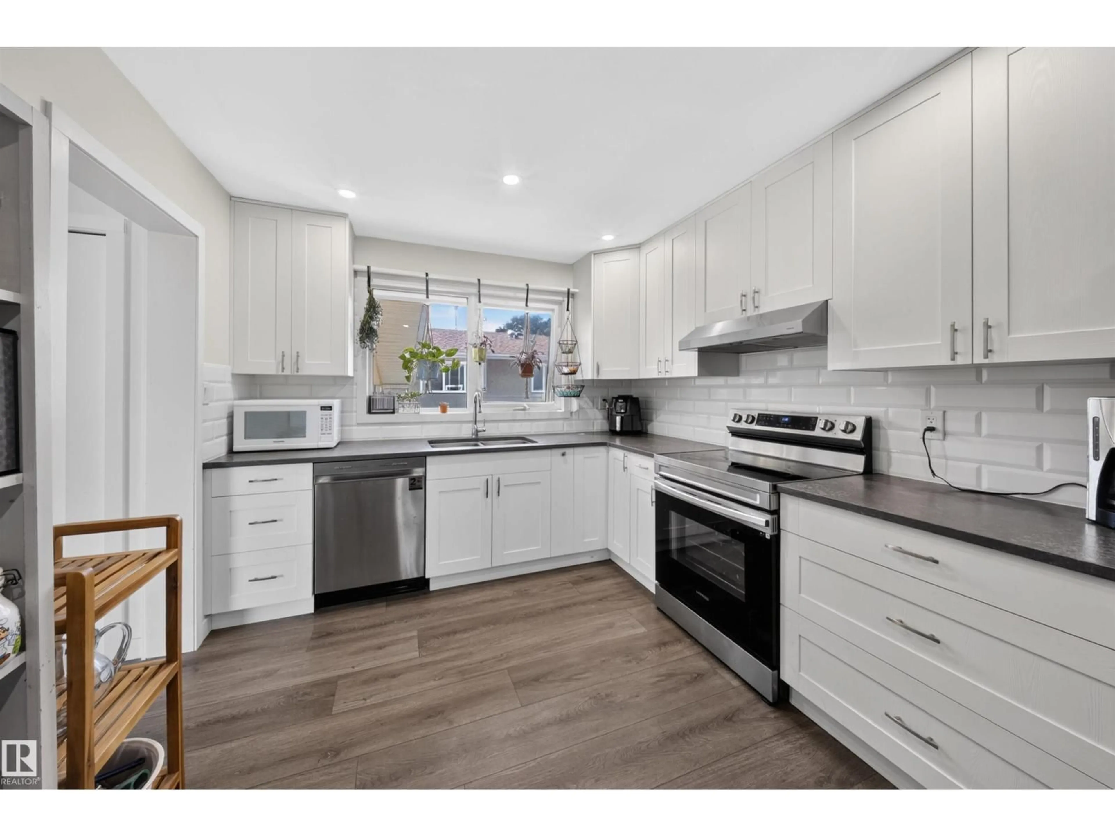 Open concept kitchen, unknown for NW - 4124 110 ST, Edmonton Alberta T6J2T5