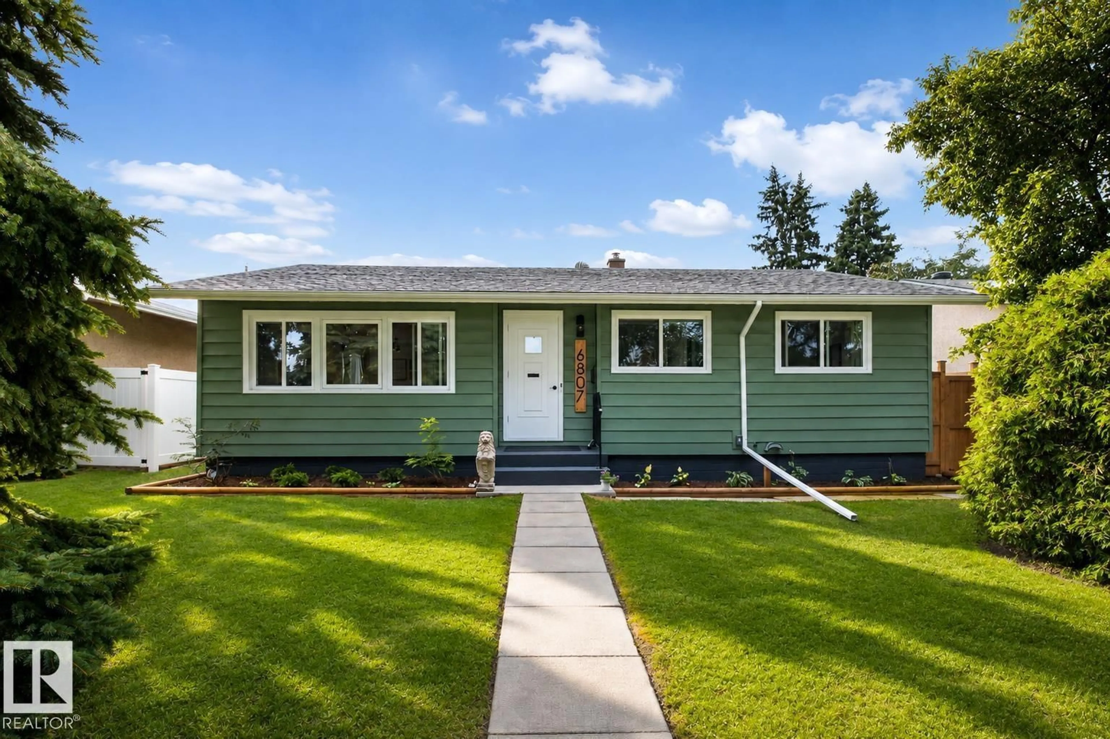 Home with vinyl exterior material, street for 6807 101A AV, Edmonton Alberta T6A0M3