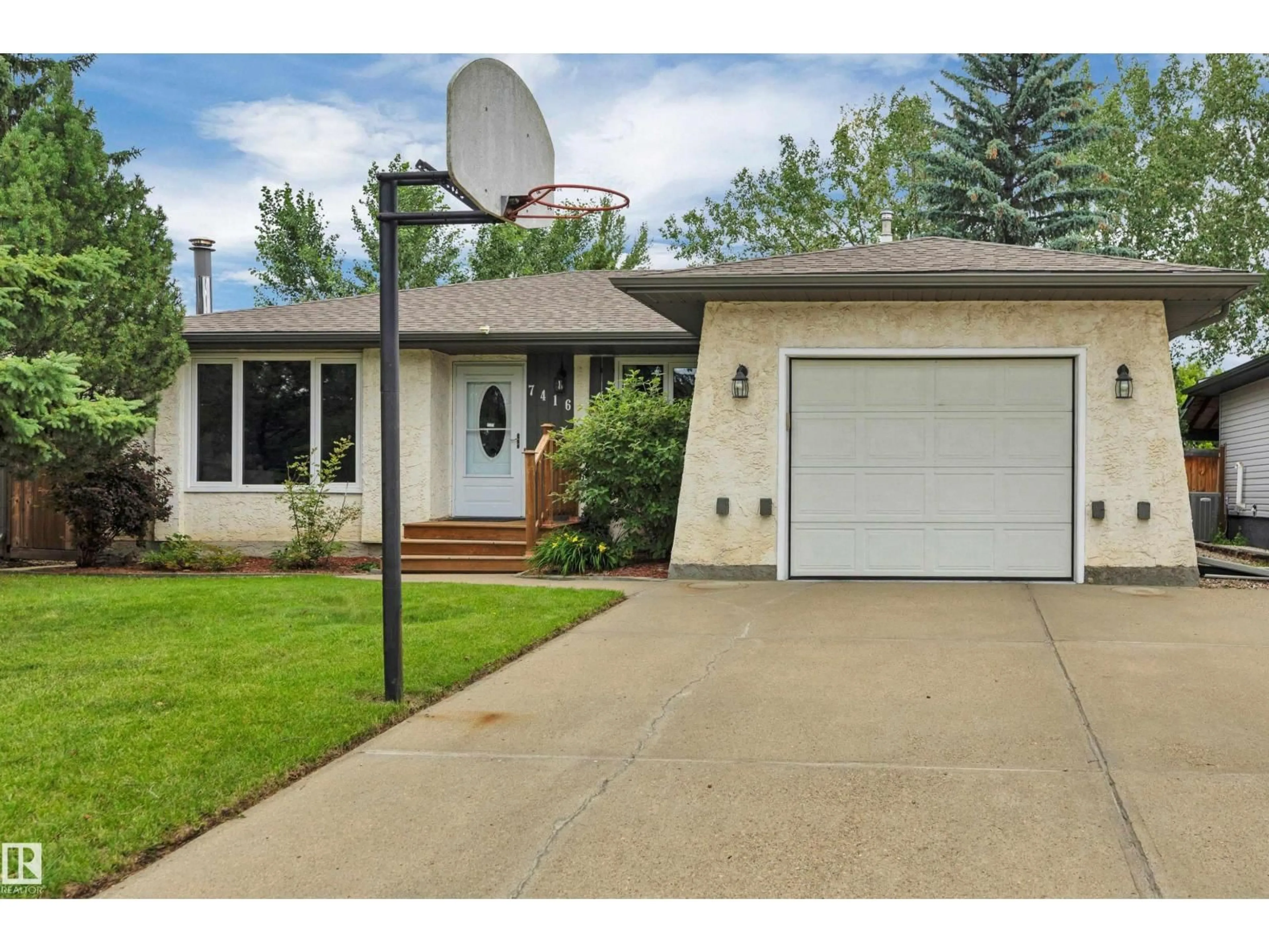 Home with vinyl exterior material, street for 7416 33 AVENUE, Edmonton Alberta T6K1J4
