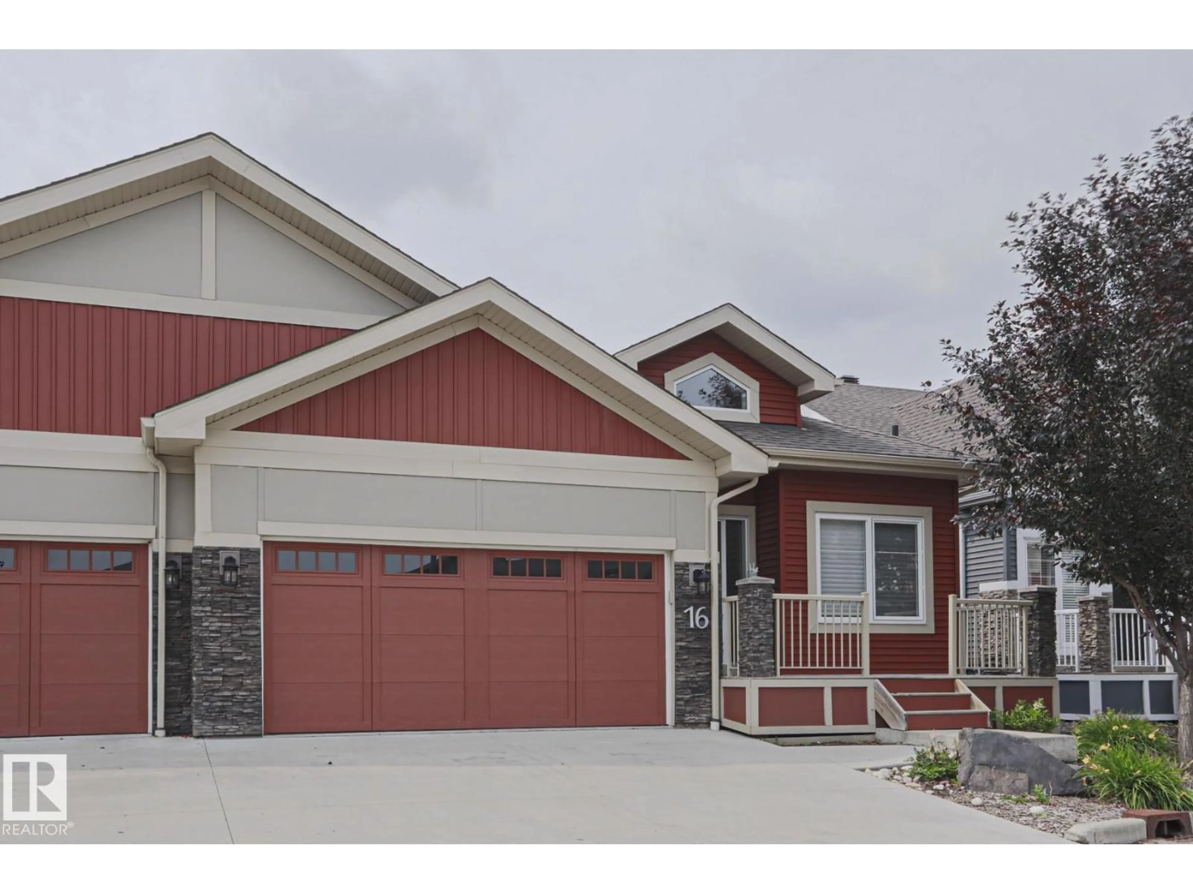 Home with vinyl exterior material, street for 16 8132 217 ST NW, Edmonton Alberta T5T4S1