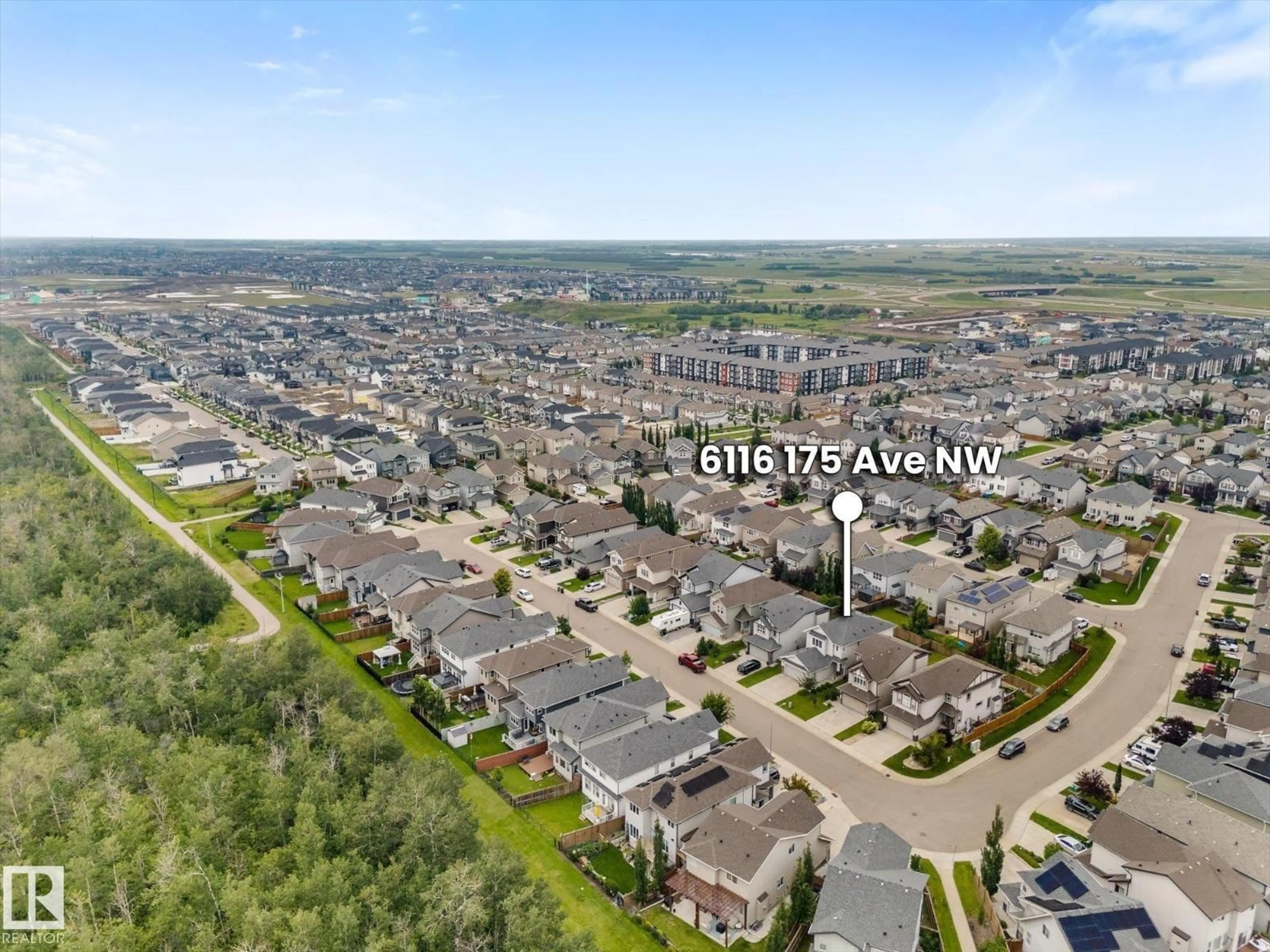 A pic from outside/outdoor area/front of a property/back of a property/a pic from drone, unknown for NW - 6116 175 AV, Edmonton Alberta T5Y3N7