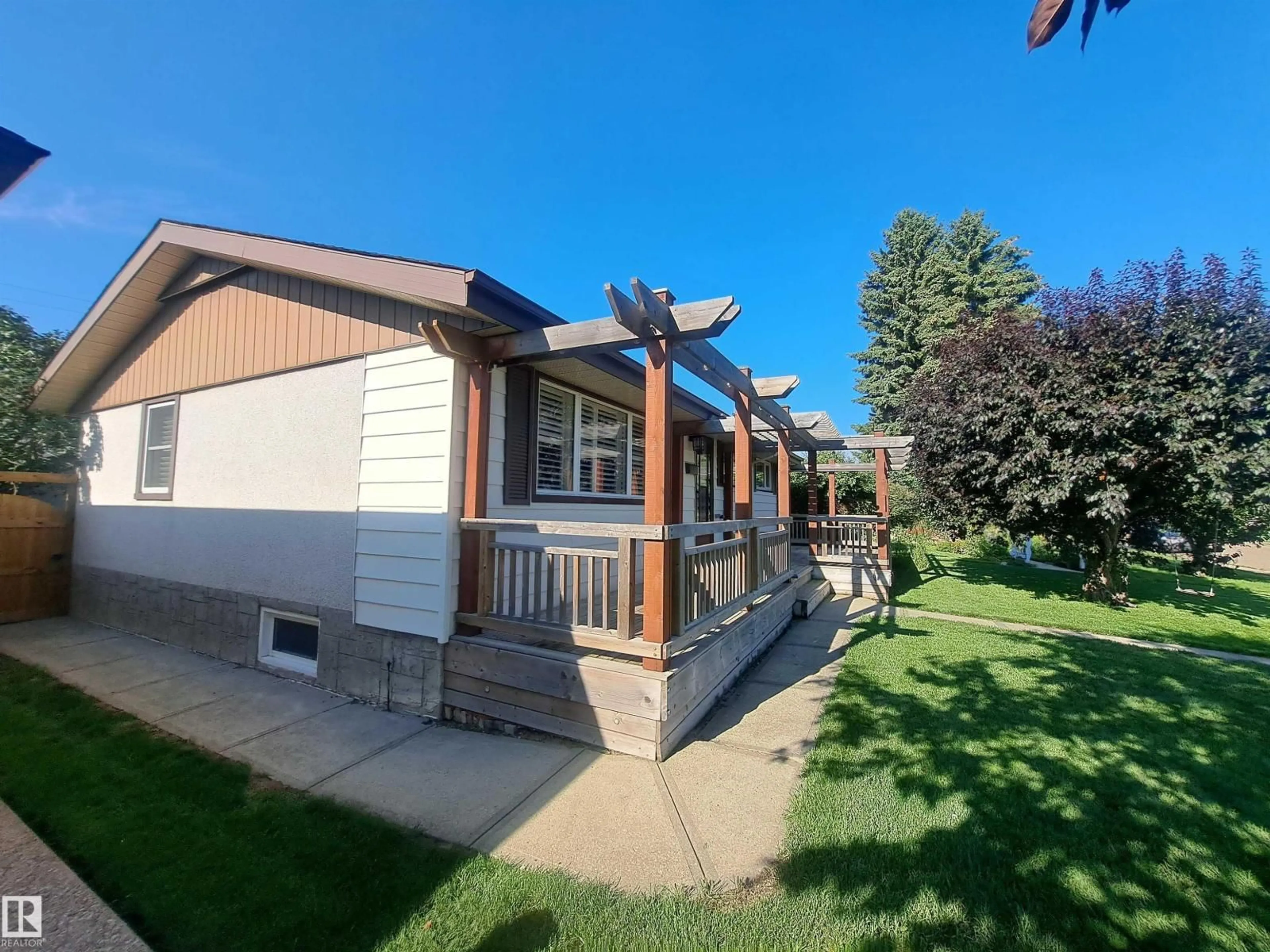 Home with vinyl exterior material, street for 6307 92A AV, Edmonton Alberta T6B0T5