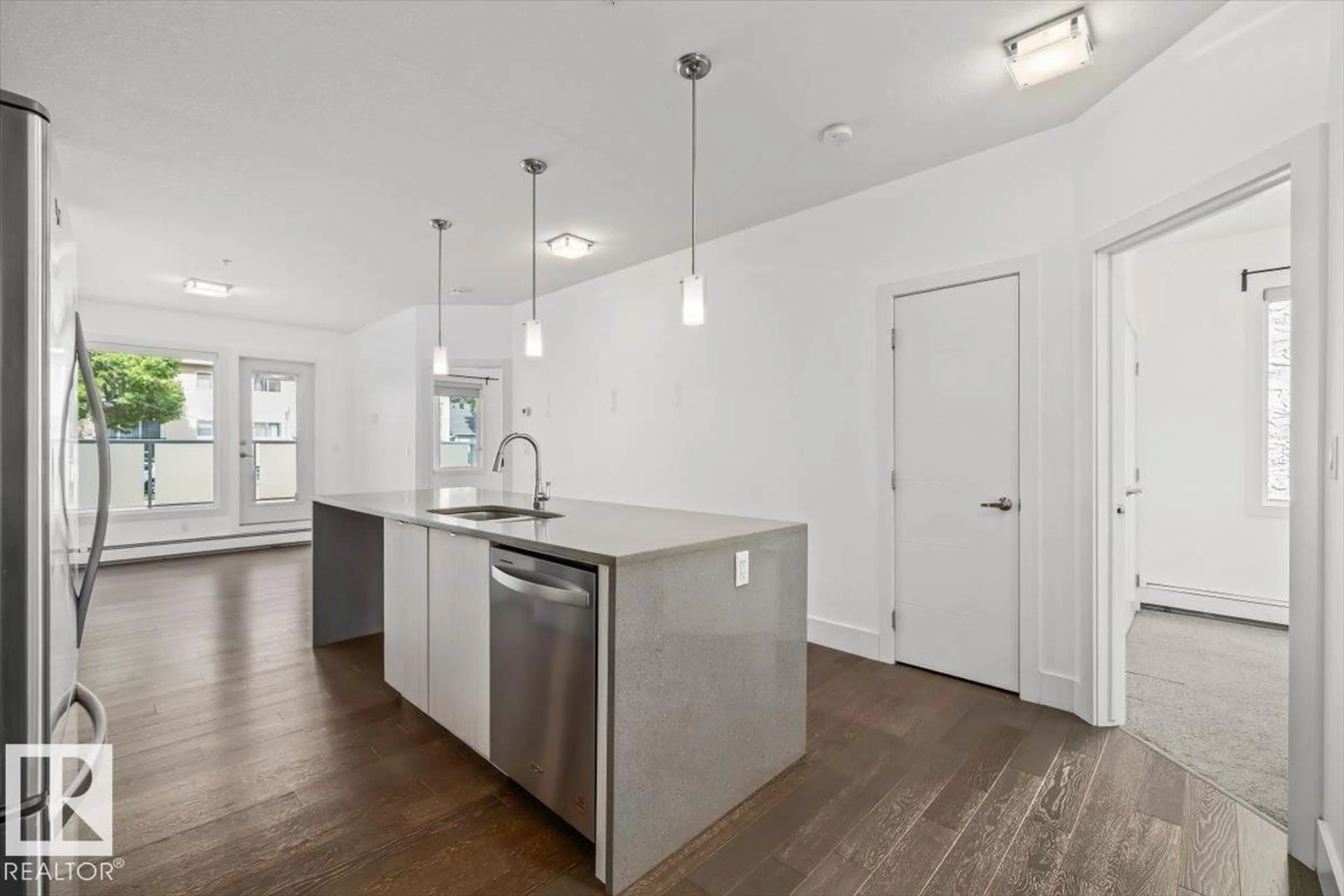 Open concept kitchen, unknown for #104 - 10030 83 AV, Edmonton Alberta T6E2C2