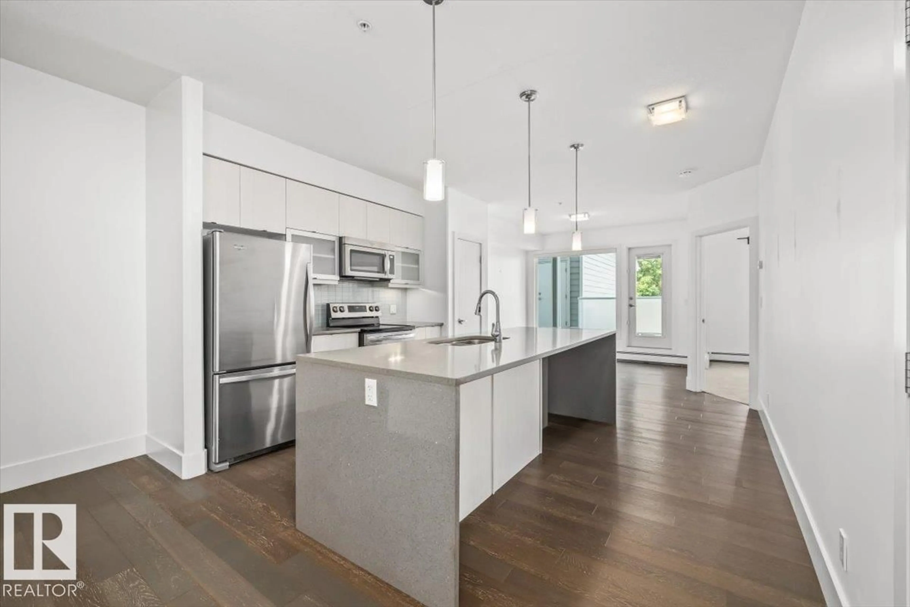 Open concept kitchen, unknown for #104 - 10030 83 AV, Edmonton Alberta T6E2C2