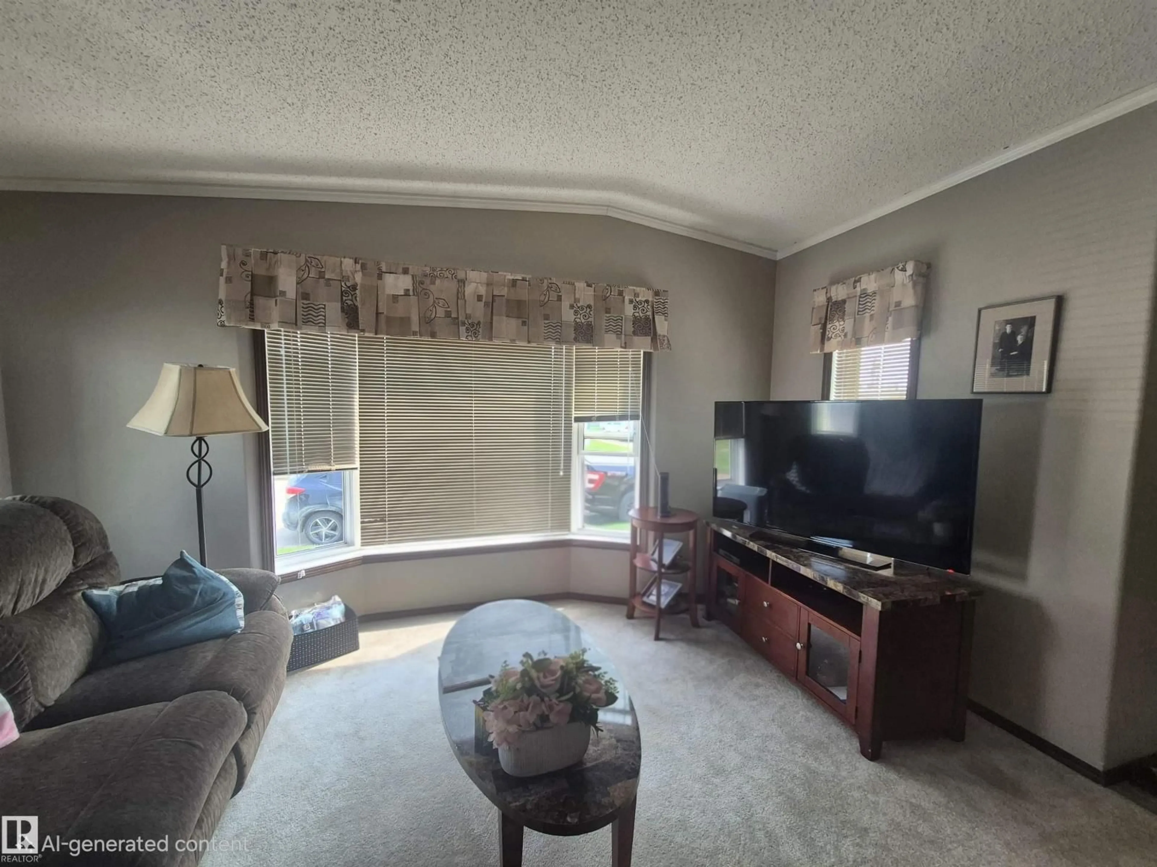 Living room with furniture, unknown for 5406 52A ST, Tofield Alberta T0B4J0