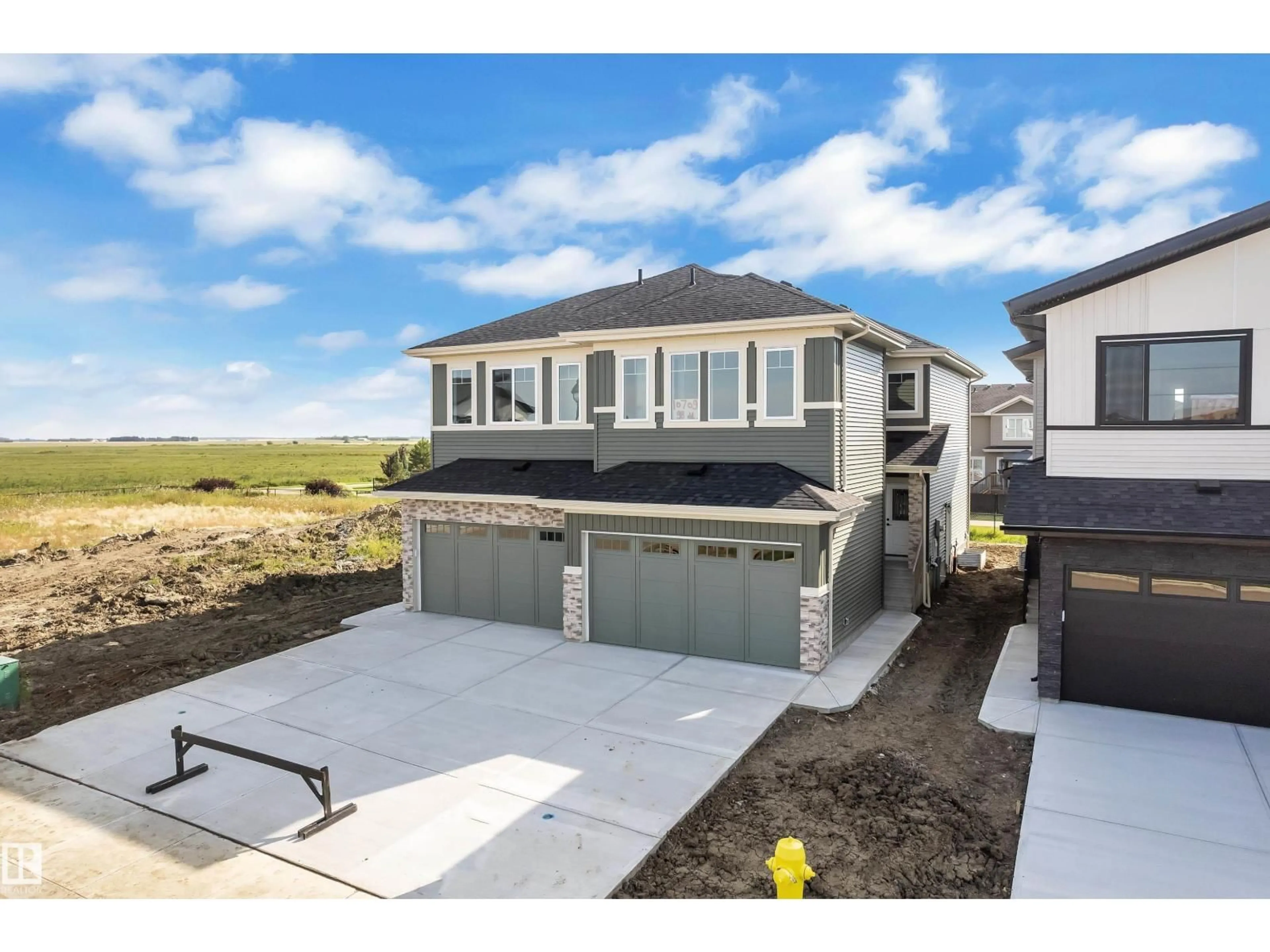 Home with vinyl exterior material, street for 10709 98 ST, Morinville Alberta T8R2R2