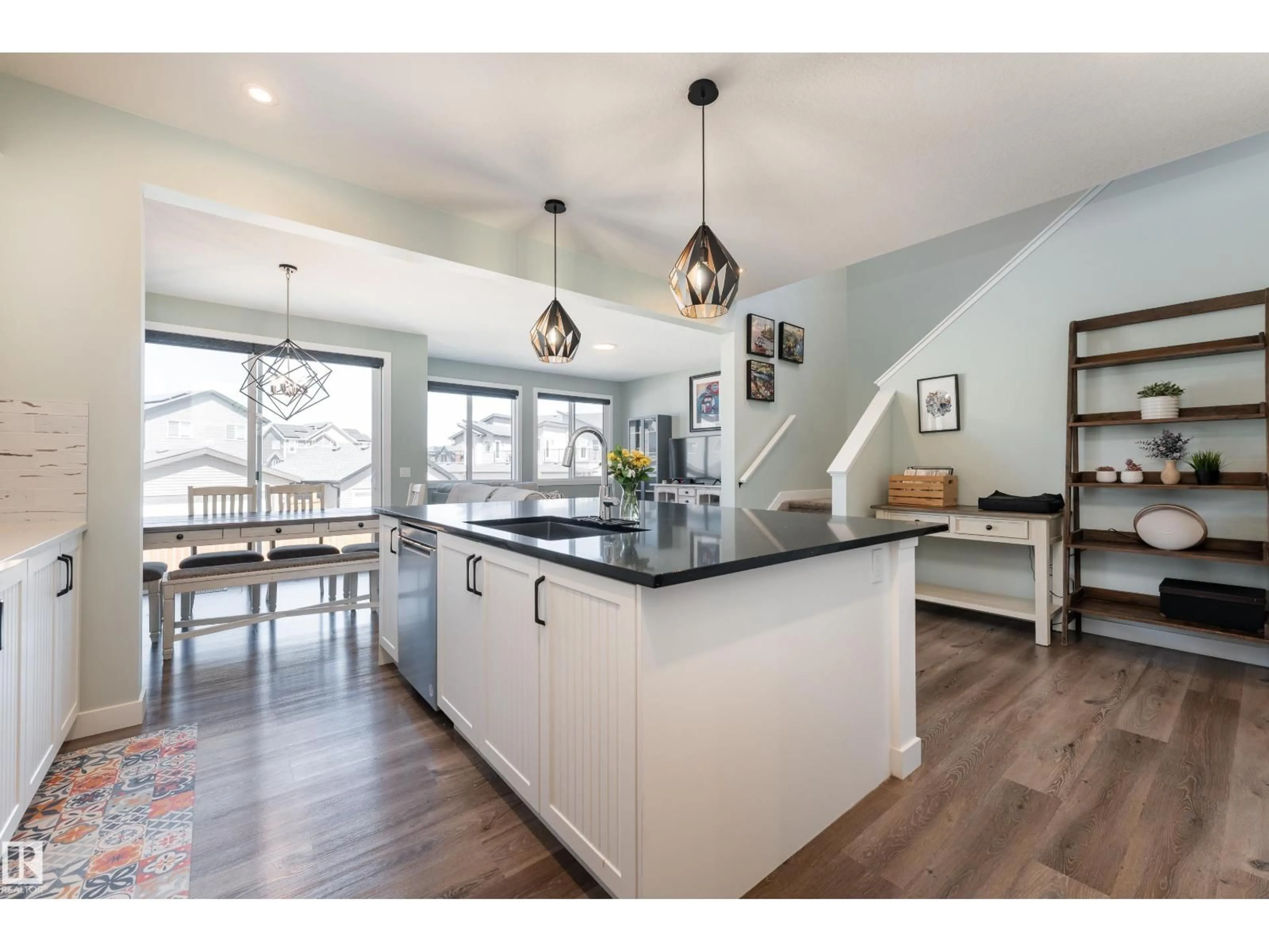 Open concept kitchen, wood/laminate floor for 1450 DARBY GREEN SW, Edmonton Alberta T6W4N5