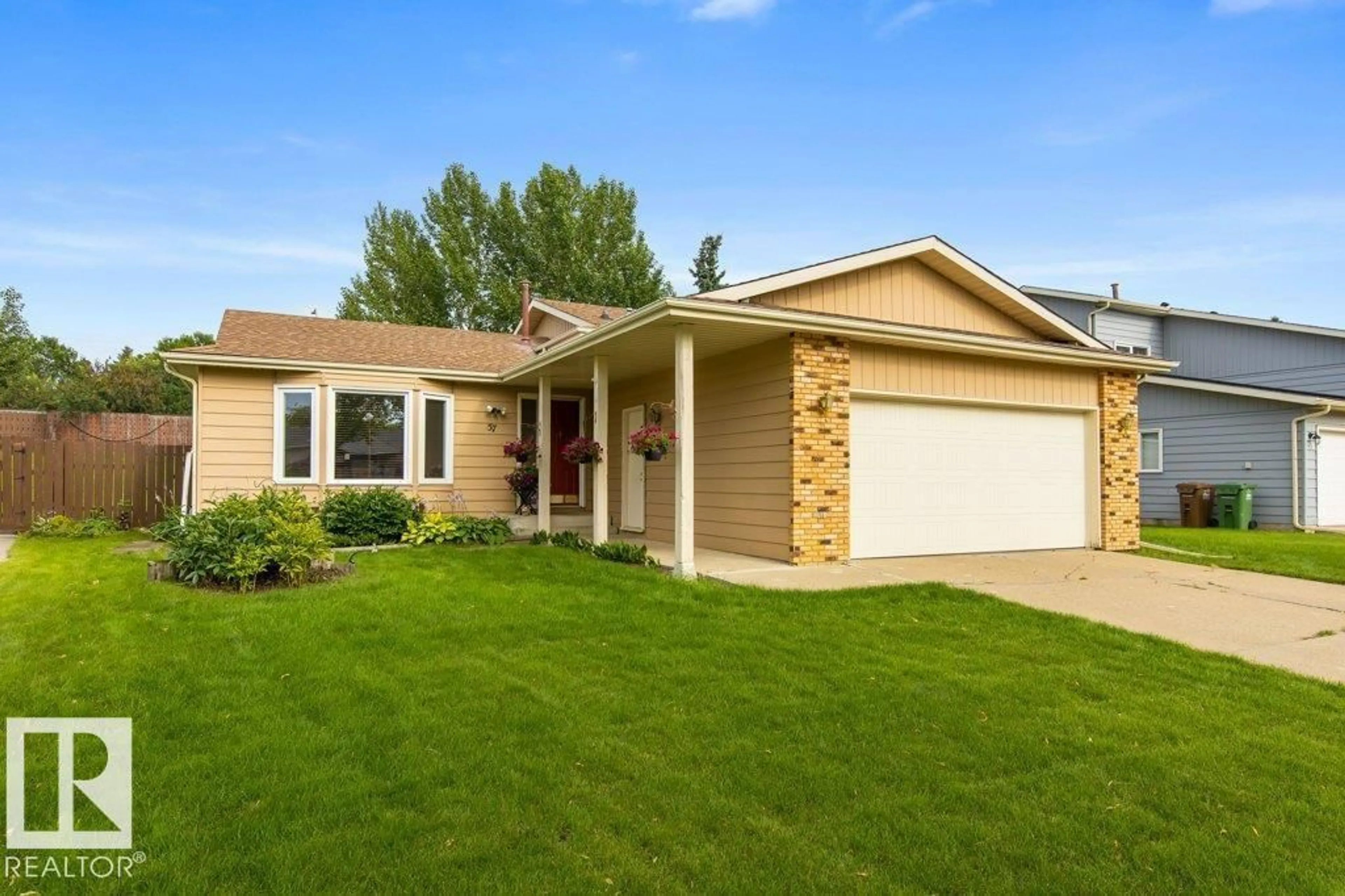Home with vinyl exterior material, street for 57 PATTERSON CR, St. Albert Alberta T8N4T9