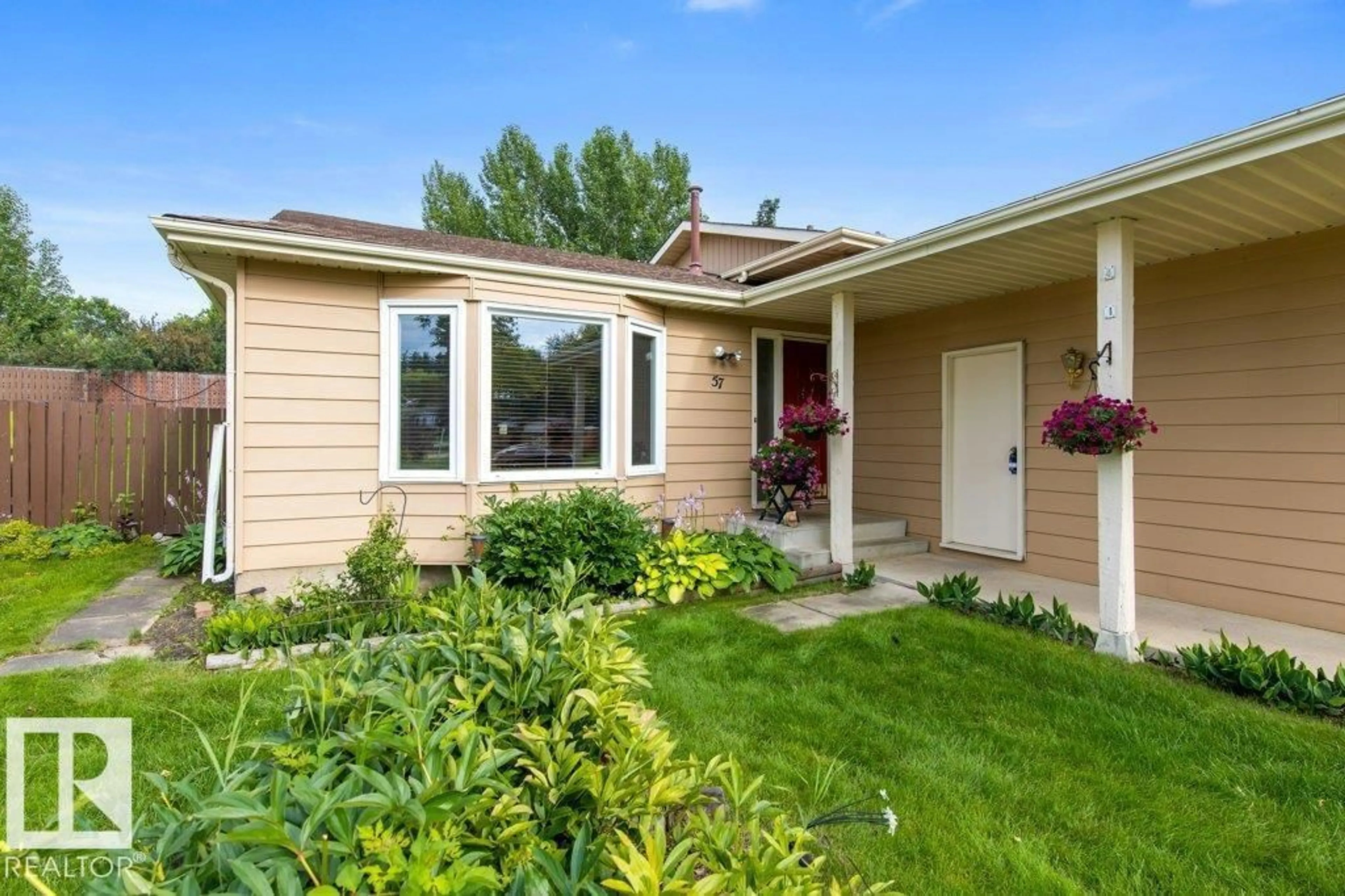 Home with vinyl exterior material, street for 57 PATTERSON CR, St. Albert Alberta T8N4T9